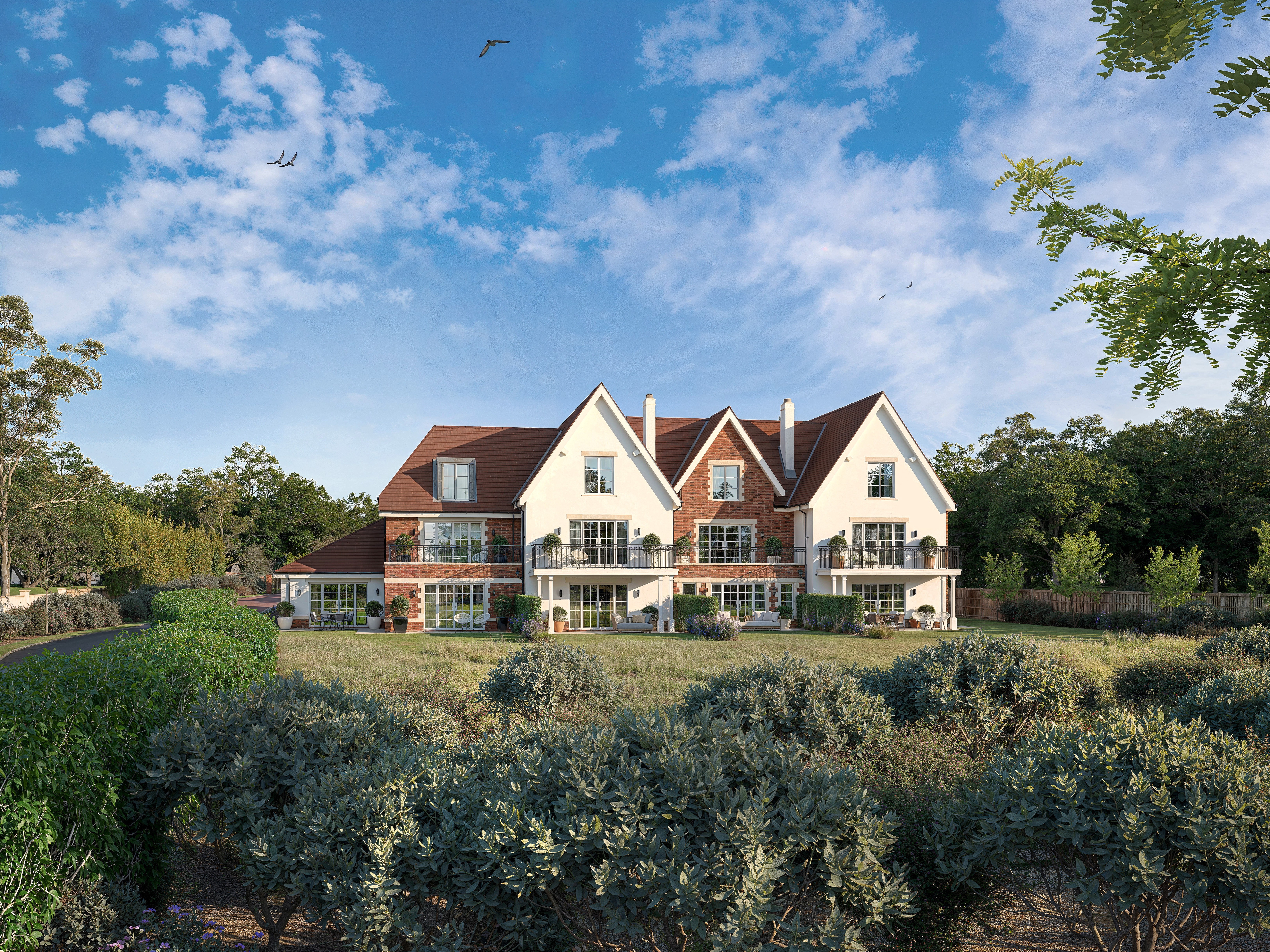 A CGI of a large luxury residential house
