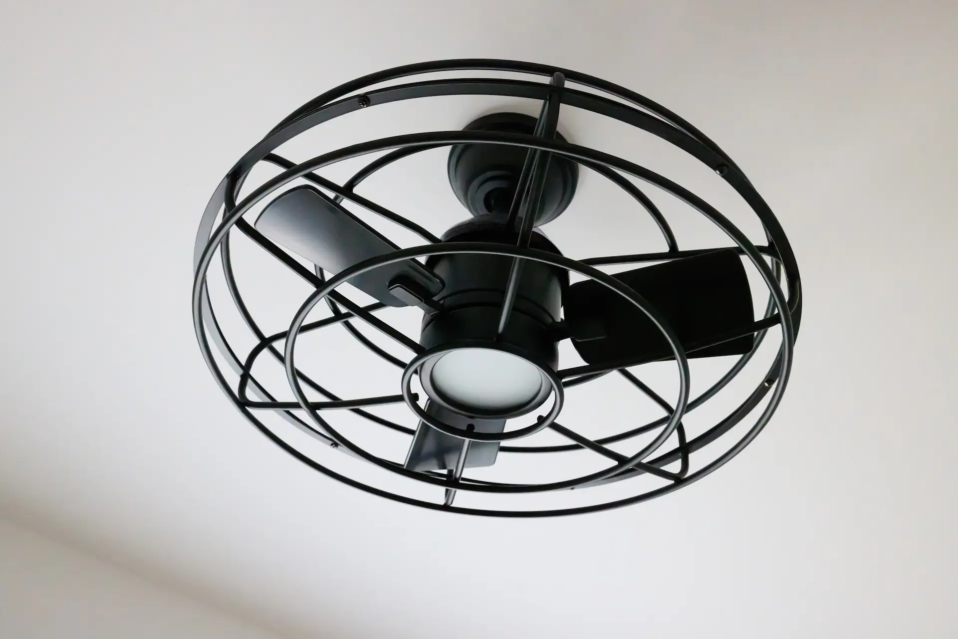 Close-up of the bedroom ceiling fan in ADU Orange, a modern amenity that complements the Craftsman style of the room. Photo by Todd Huge.