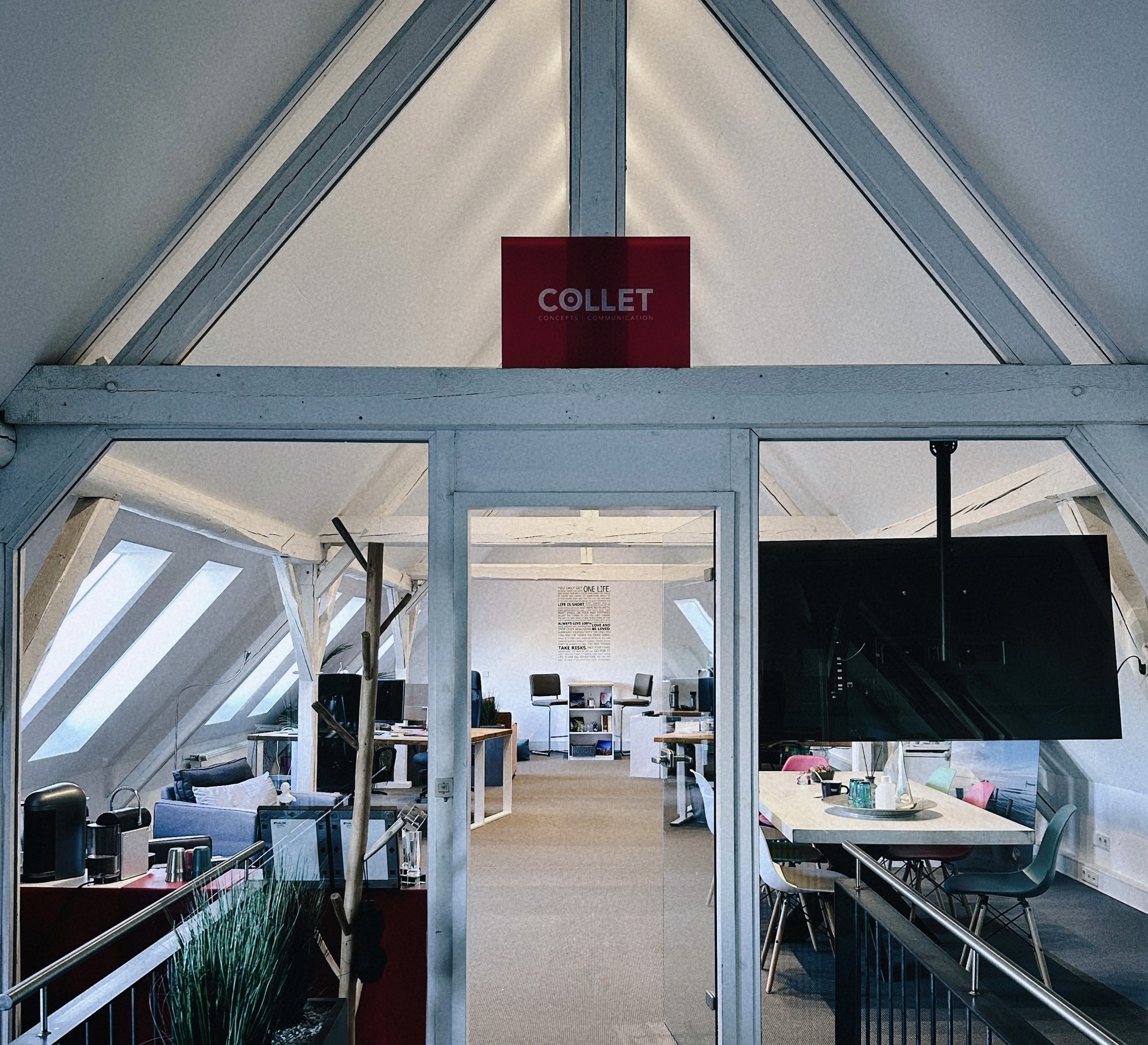 Black cosmetic jar on dark stone surface