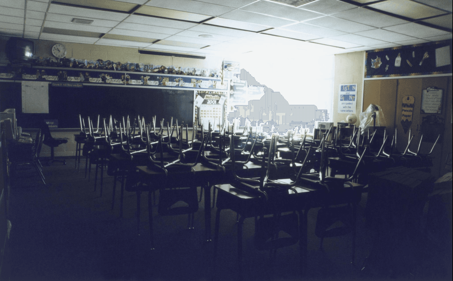 Quiet classroom environment representing structured literacy and the Orton-Gillingham approach to reading instruction, where phonemic awareness, sound-based decoding, and automatic word recognition are developed before comprehension carries meaning.