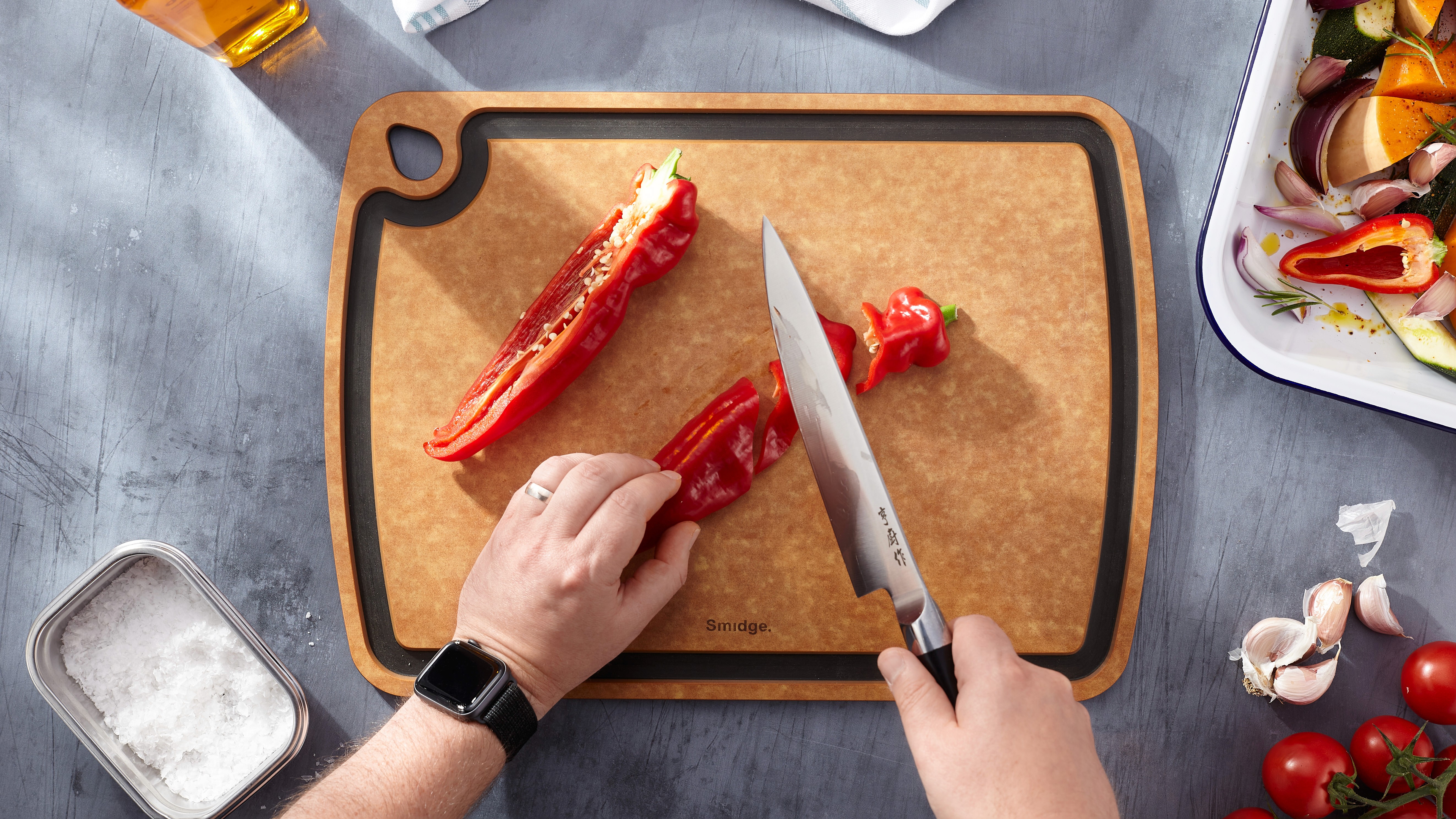 Wood cutting board with knife