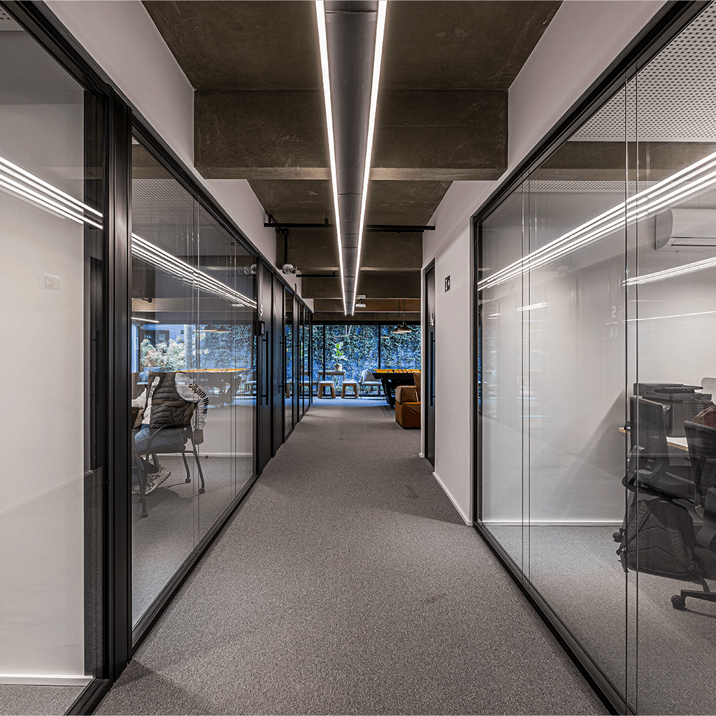 Close-up of white fur with black heart-shaped spots—soft, high-contrast texture for fashion/home décor.