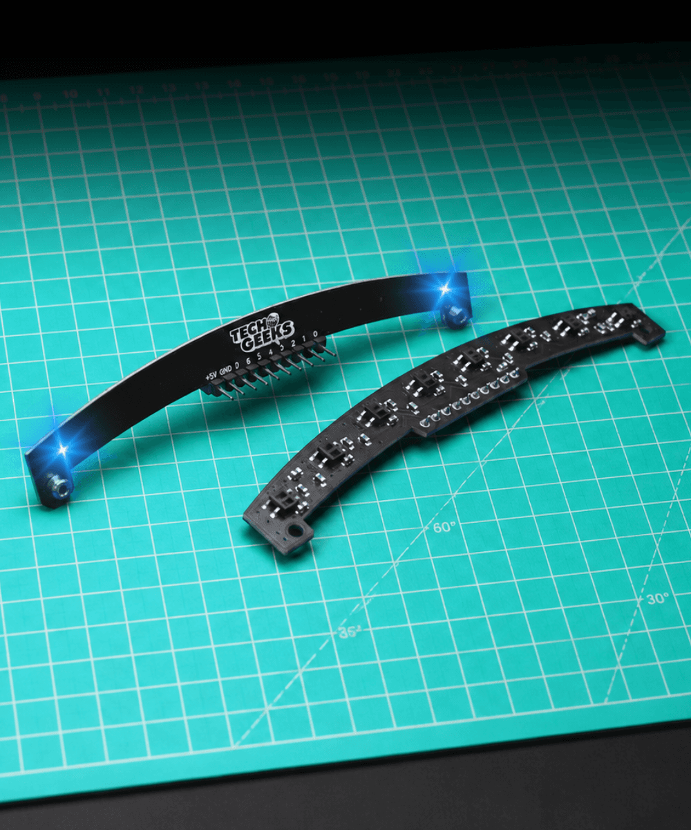 ARC8 sensor array hero shot – 8-channel analog IR array by TechGeeks on blue cutting mat