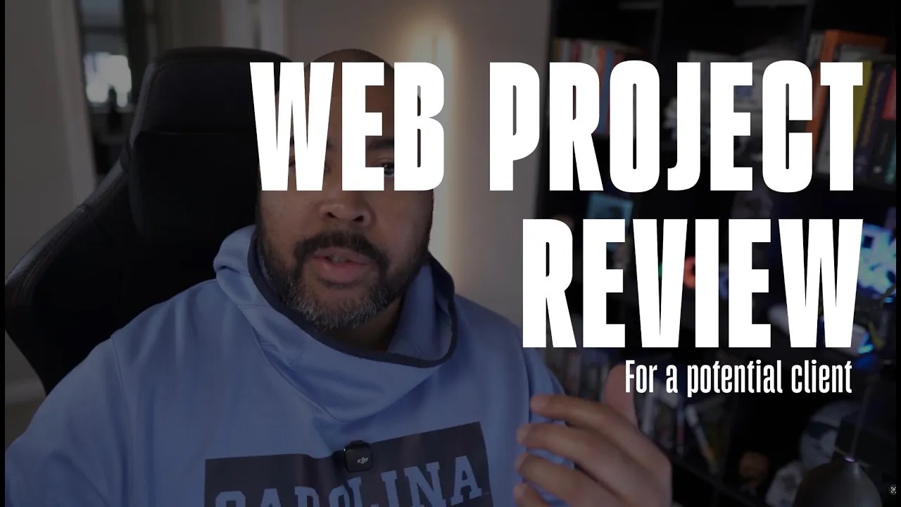 YouTube thumbnail of a man in a Carolina hoodie sitting at a desk with bold text overlay reading "Web Project Review – For a potential client."