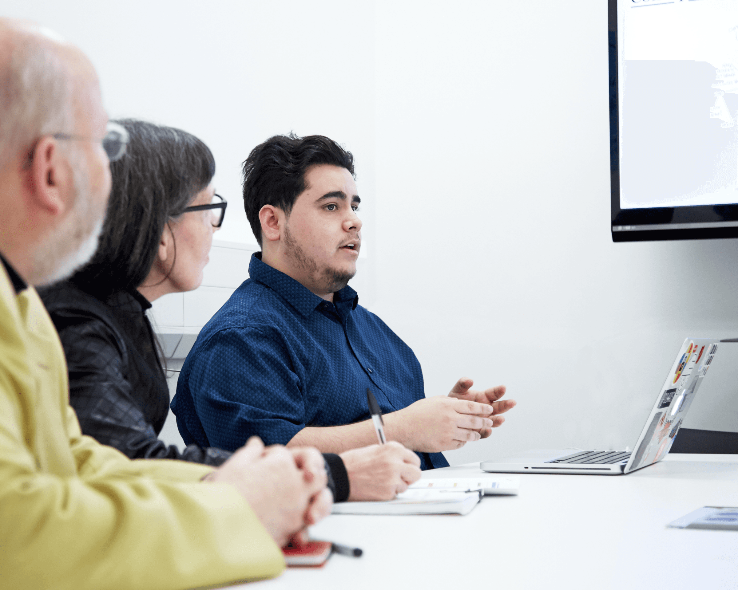 Photo of me presenting to stakeholders.