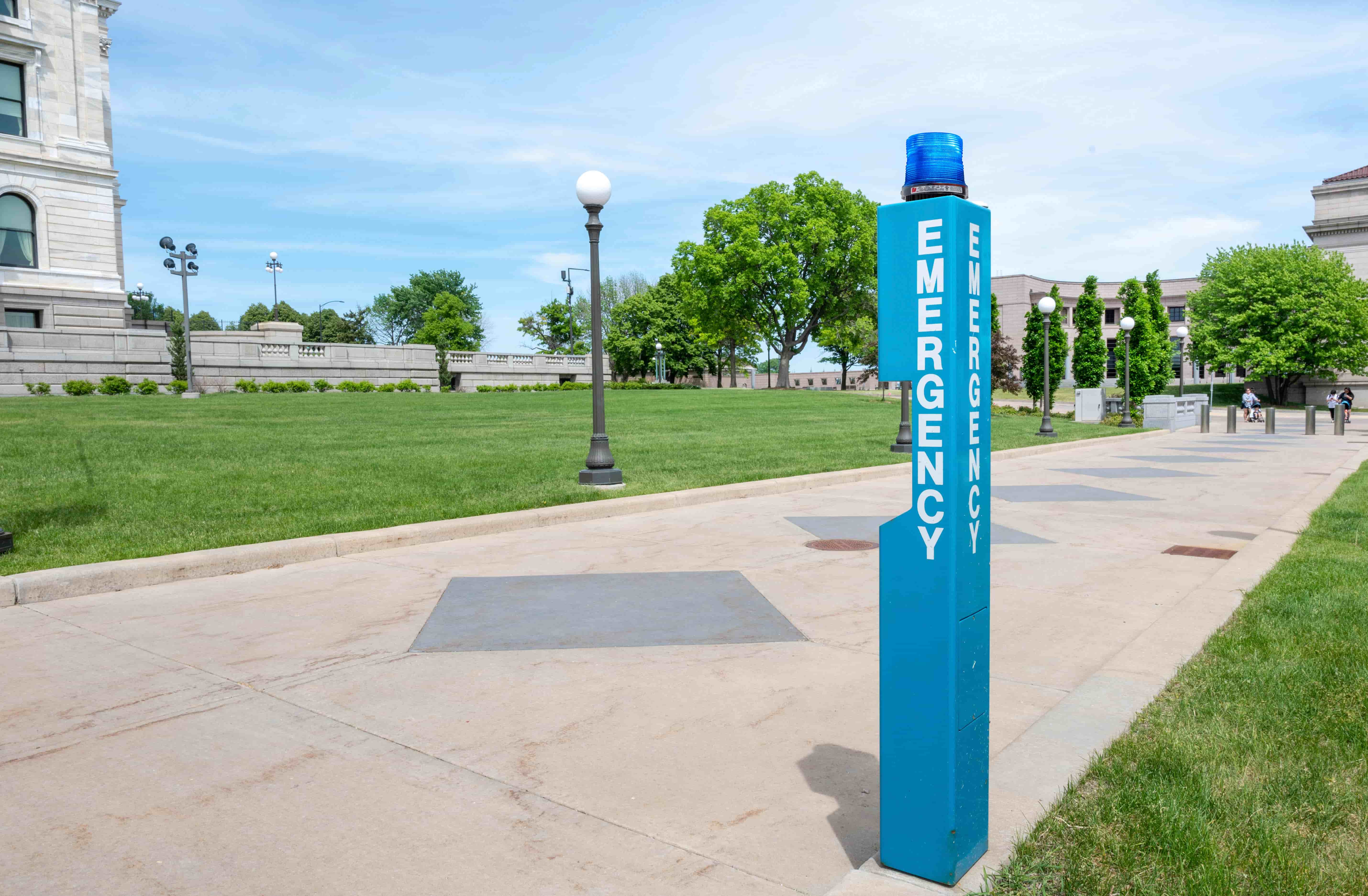 Federal Signal integrated mass notification and emergency alerting platforms for large facilities and campuses in BCue load management technology for balancing electrical demand across multiple EV charging points in commercial installations in BC