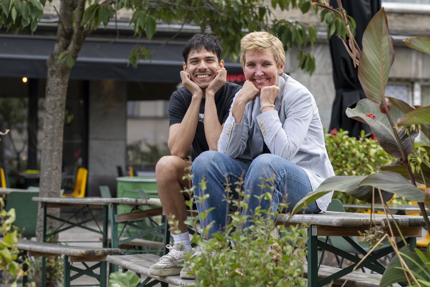 people holding miniature figures