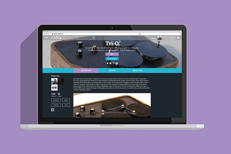 A laptop screen displays a website titled "Tri-O," featuring a dark background with light blue tabs. The site includes images of turntables and text describing a project involving a complex, rational-working machine with unpredictable irregularity. A smaller image shows a turntable setup with cables and components. The laptop rests on a light-colored surface against a solid purple background.