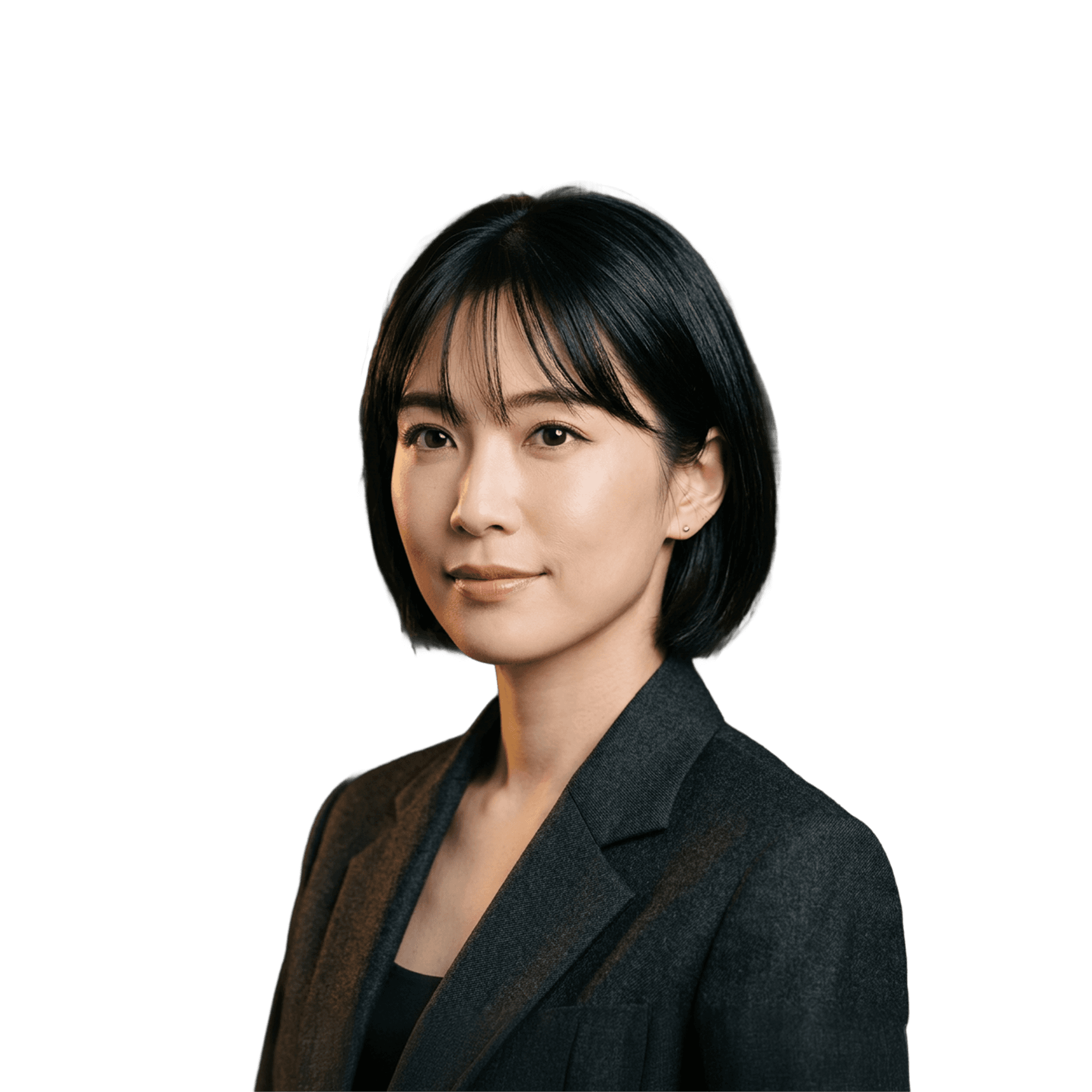 Portrait of Tomoko Ishida, Senior Architect at ARCHIV Studio, against a dark charcoal background