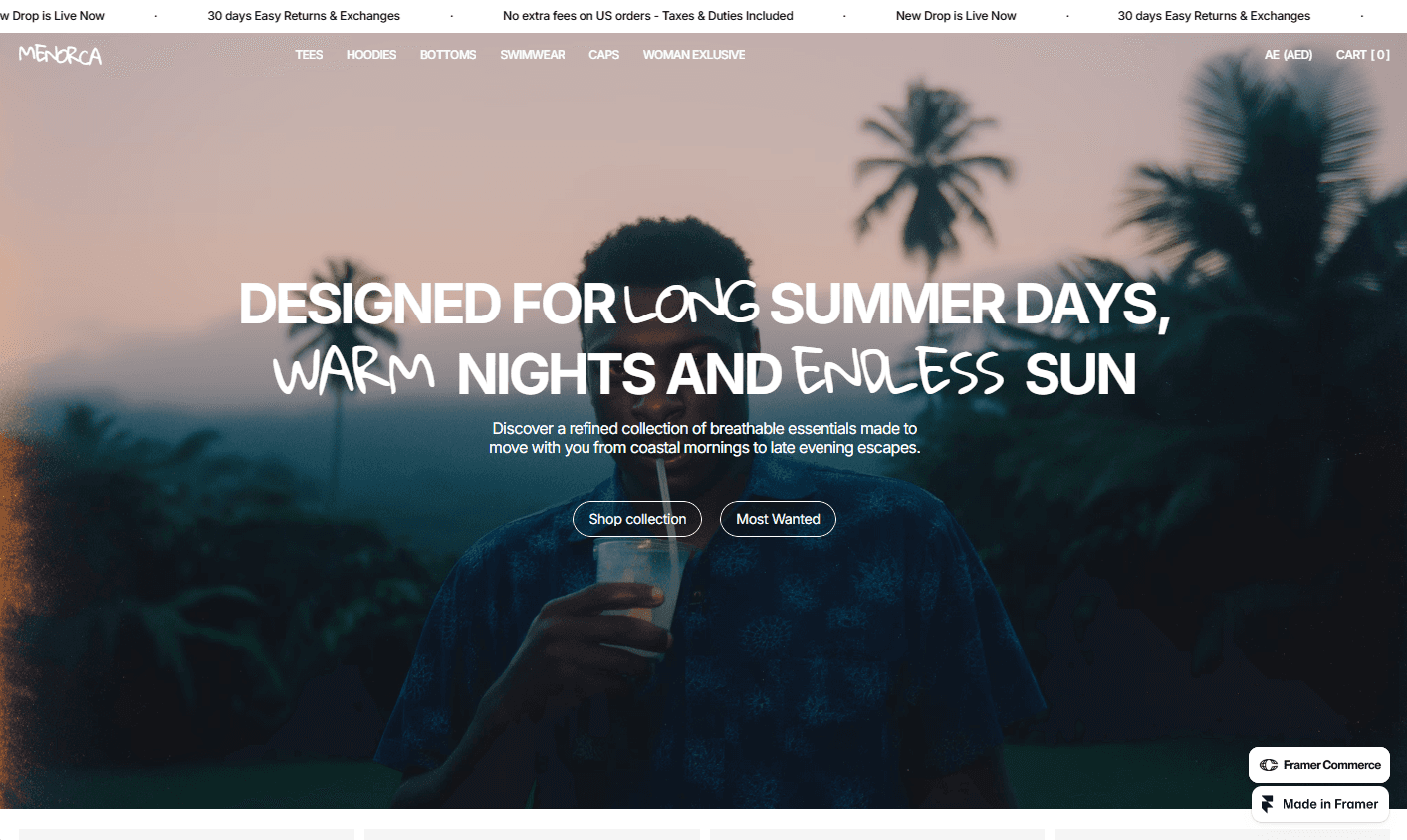 Menorca clothing homepage with hero banner of a man holding a drink at sunset, tropical palms, and "Shop collection" button.