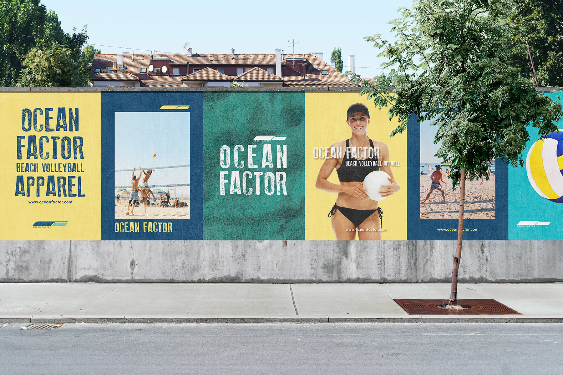 photo of a construction wall with Ocean Factor Beach Volleyball posters with sidewalk and palm tree