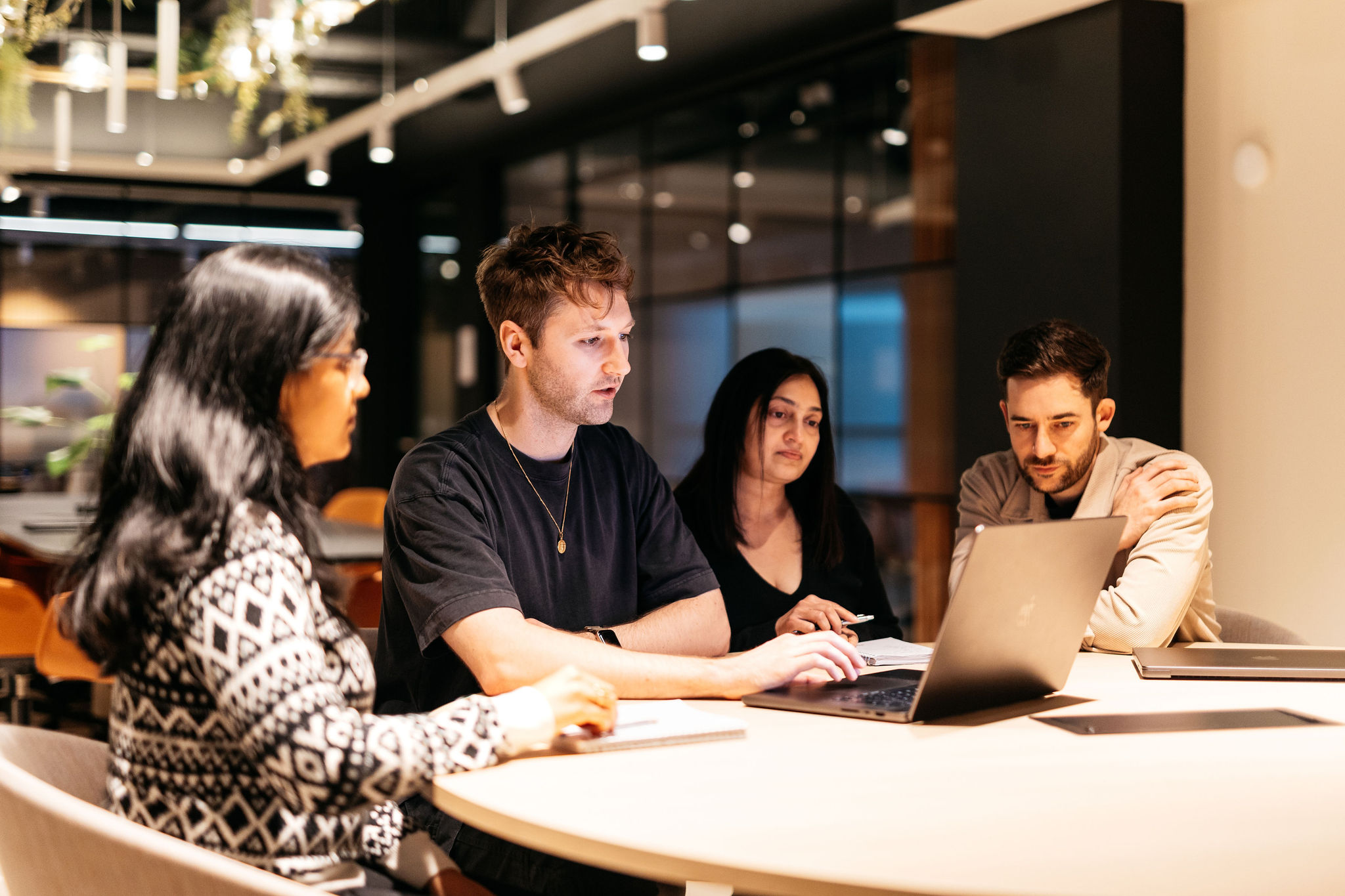 Brainstorming session with Product Specialists around a table