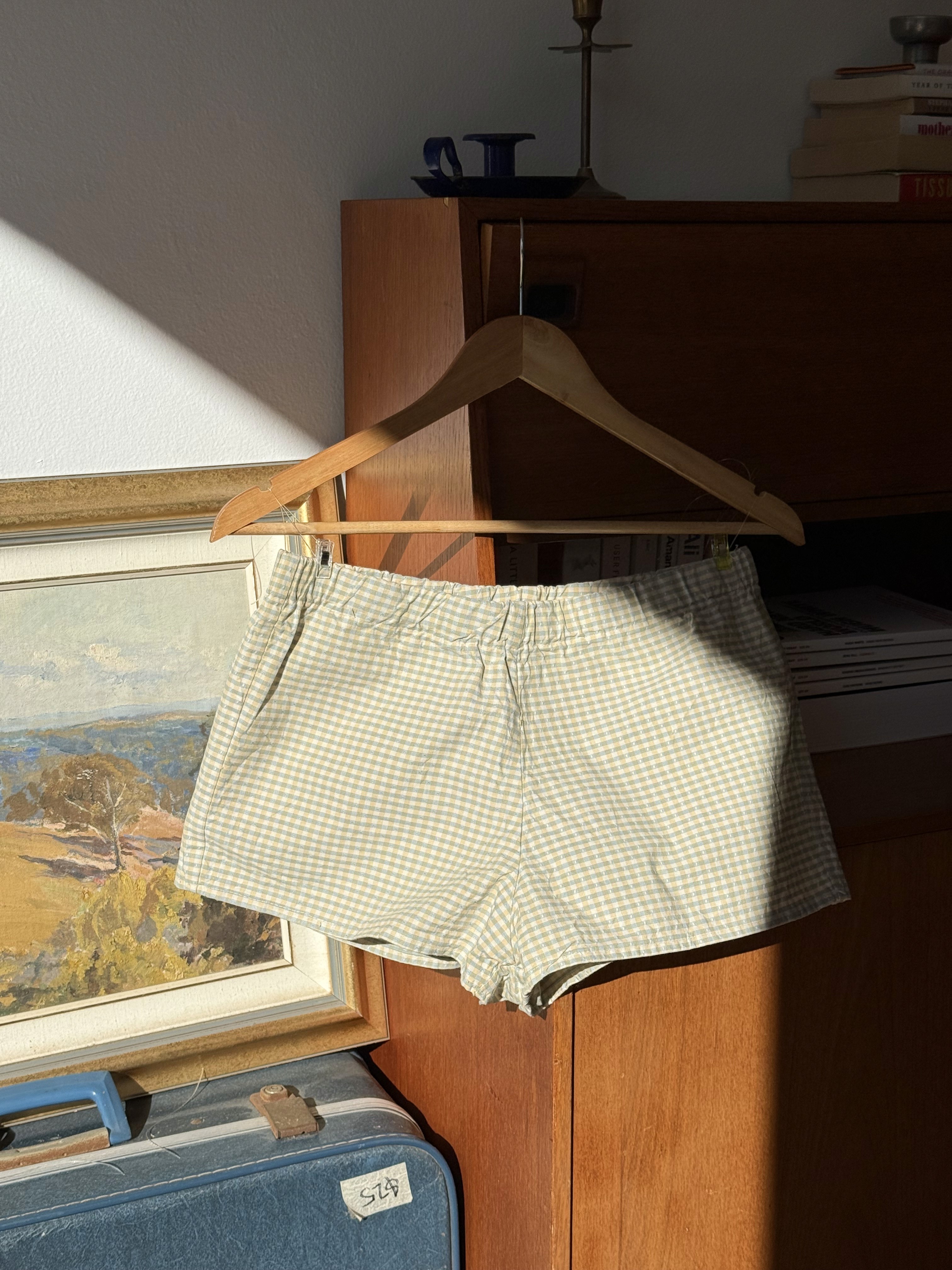 back of yellow and green checkered shorts