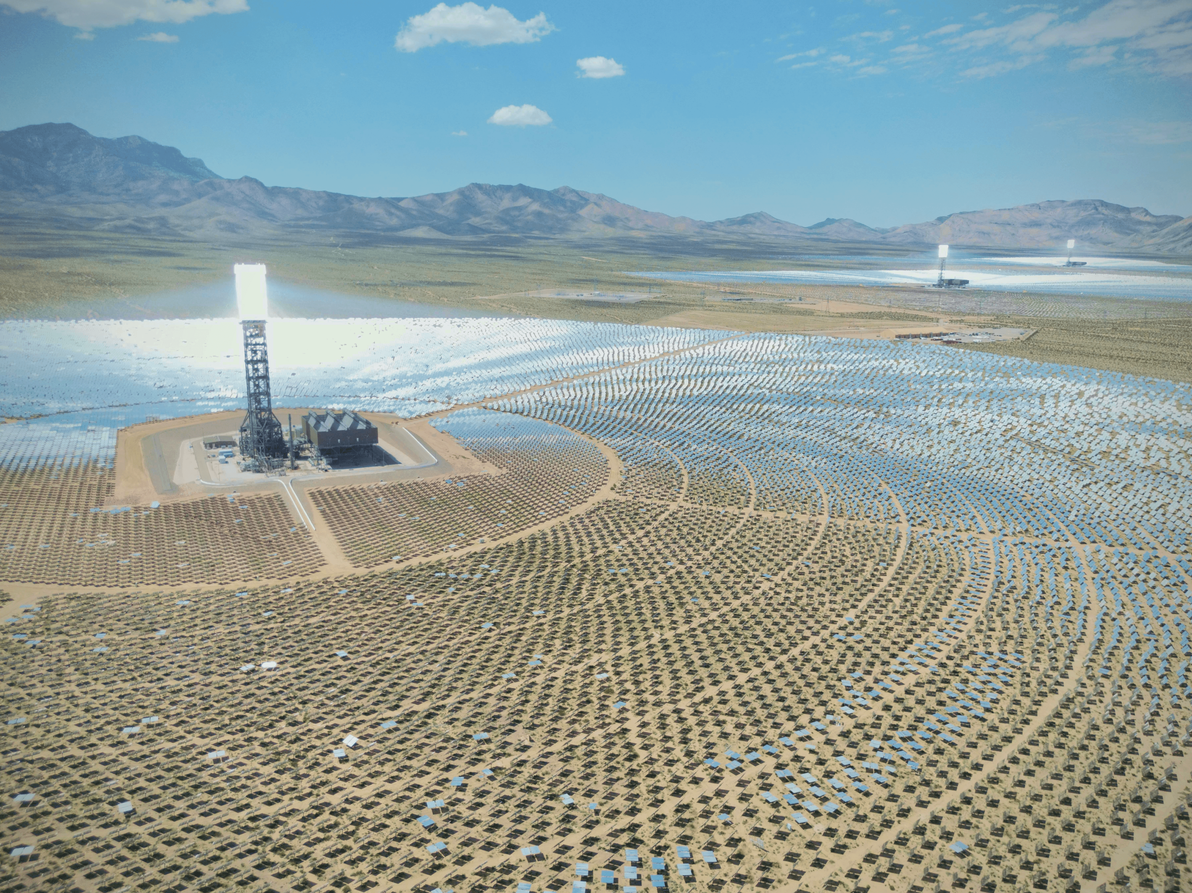 green grass field during sunset