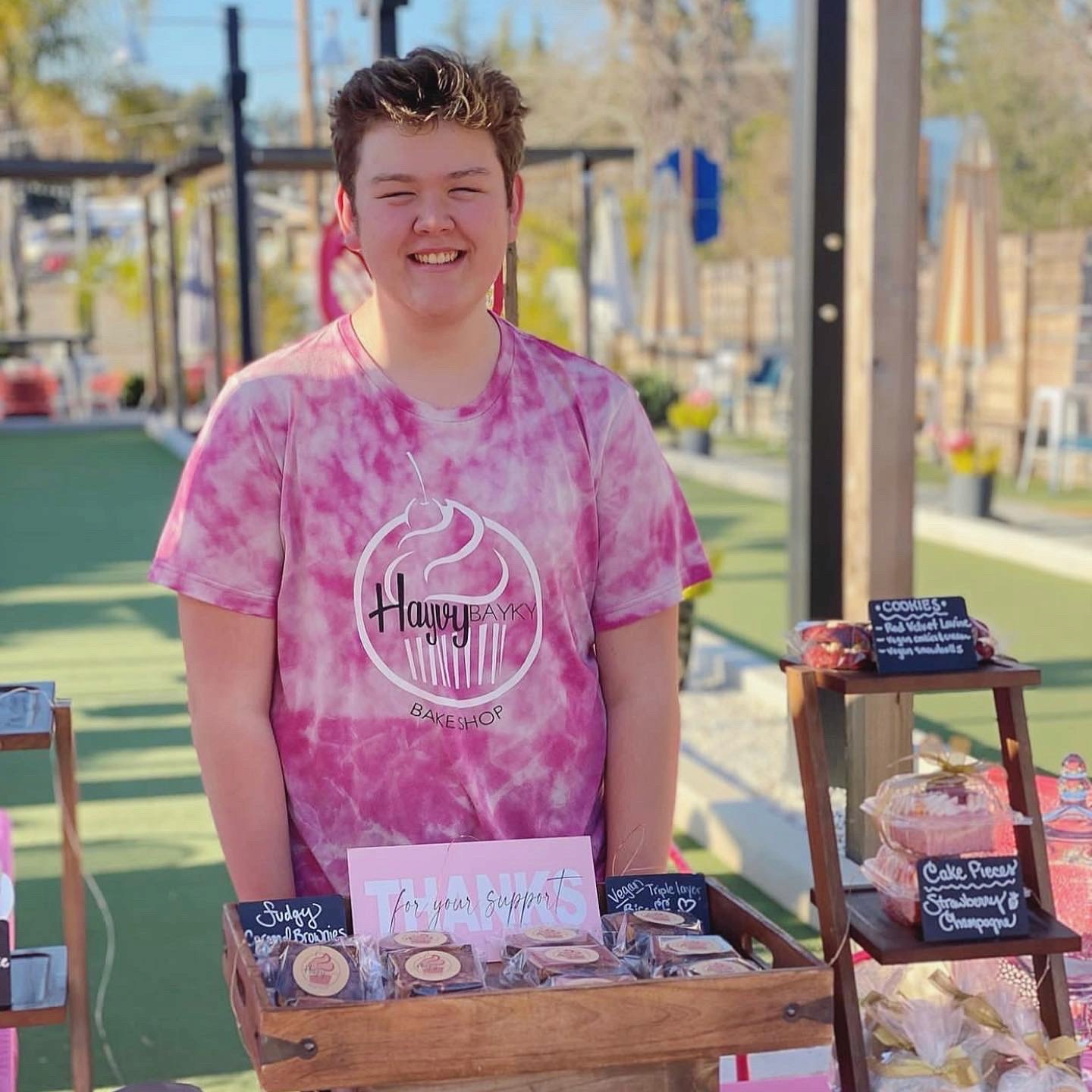 Layered latte in glass with flowers and plants