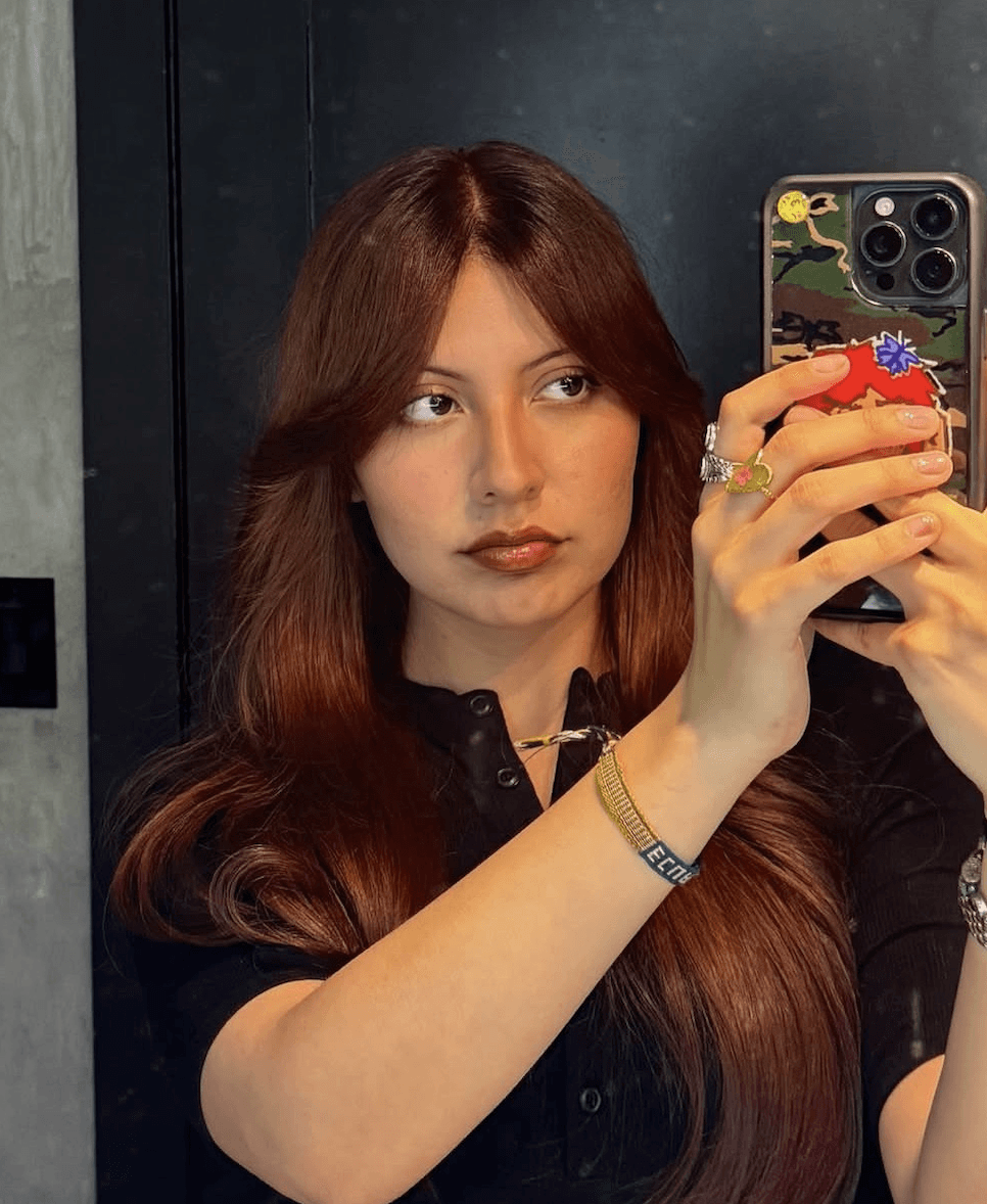 Brunette balayage with lived-in color, hair salon for textured hair, warm caramel highlights
