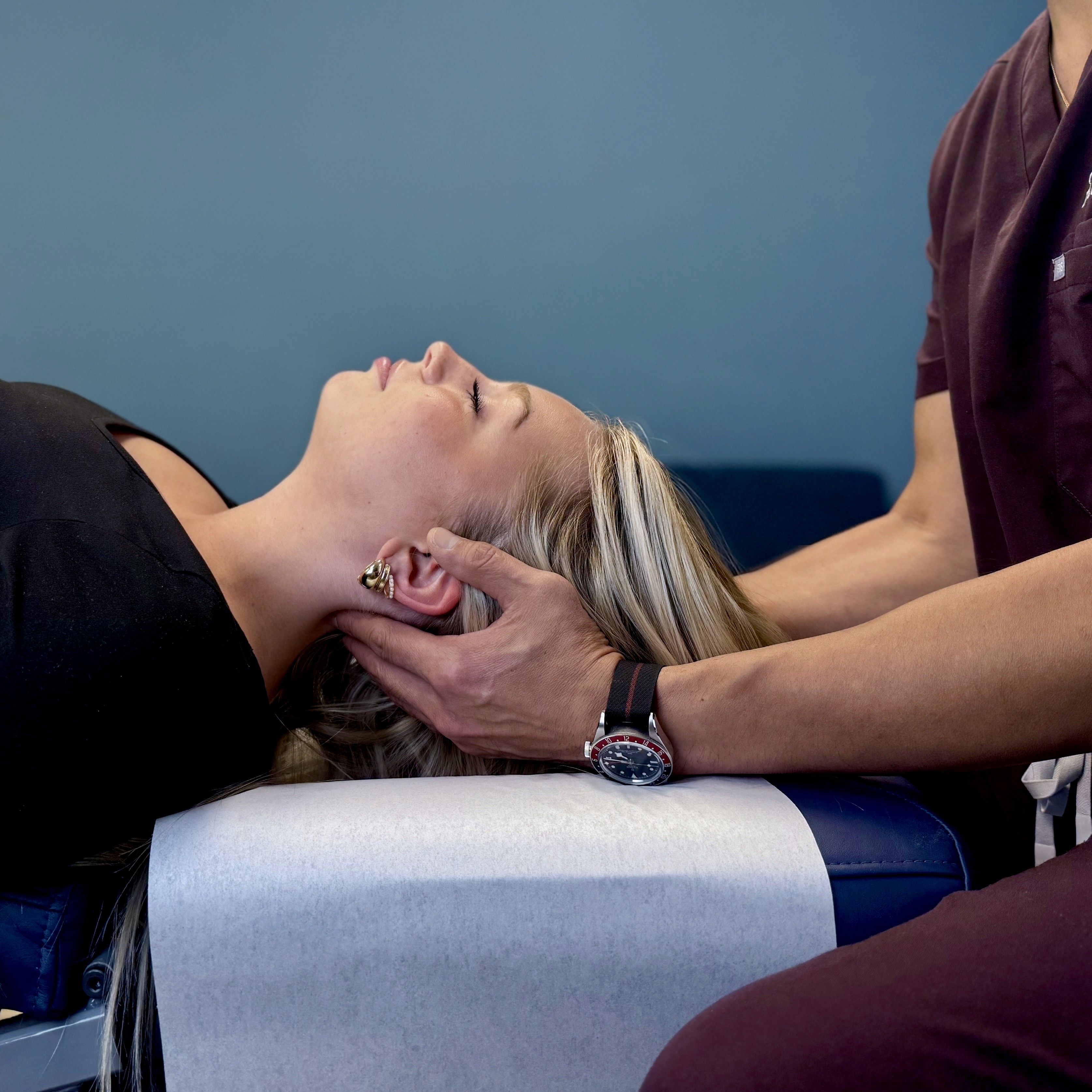 Patient receiving chiropractic adjustment