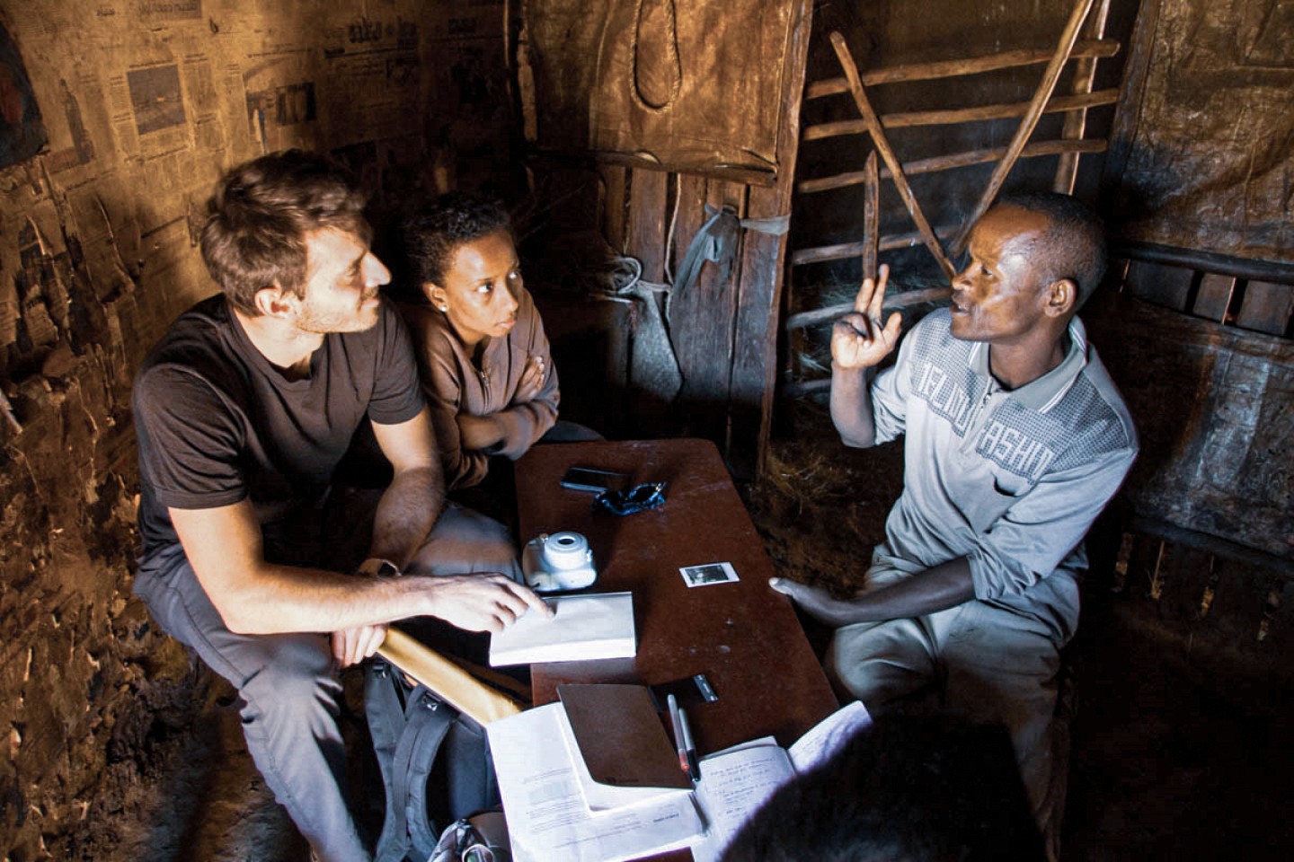 Family gets interviewed in qualitative research session.