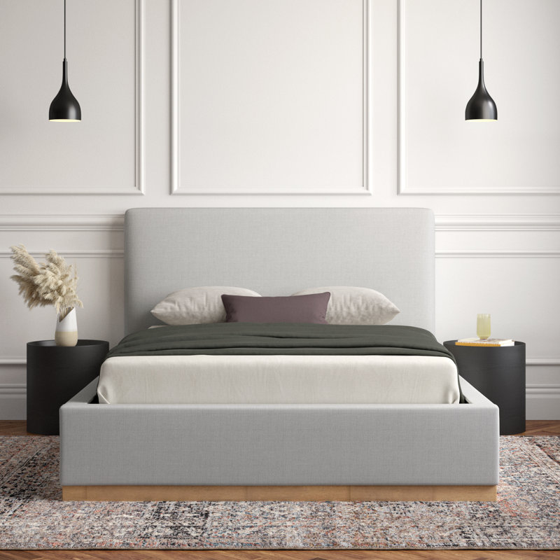 The delpha grounded upholstered wood base bed blends modern aesthetics with practical design for any setting.