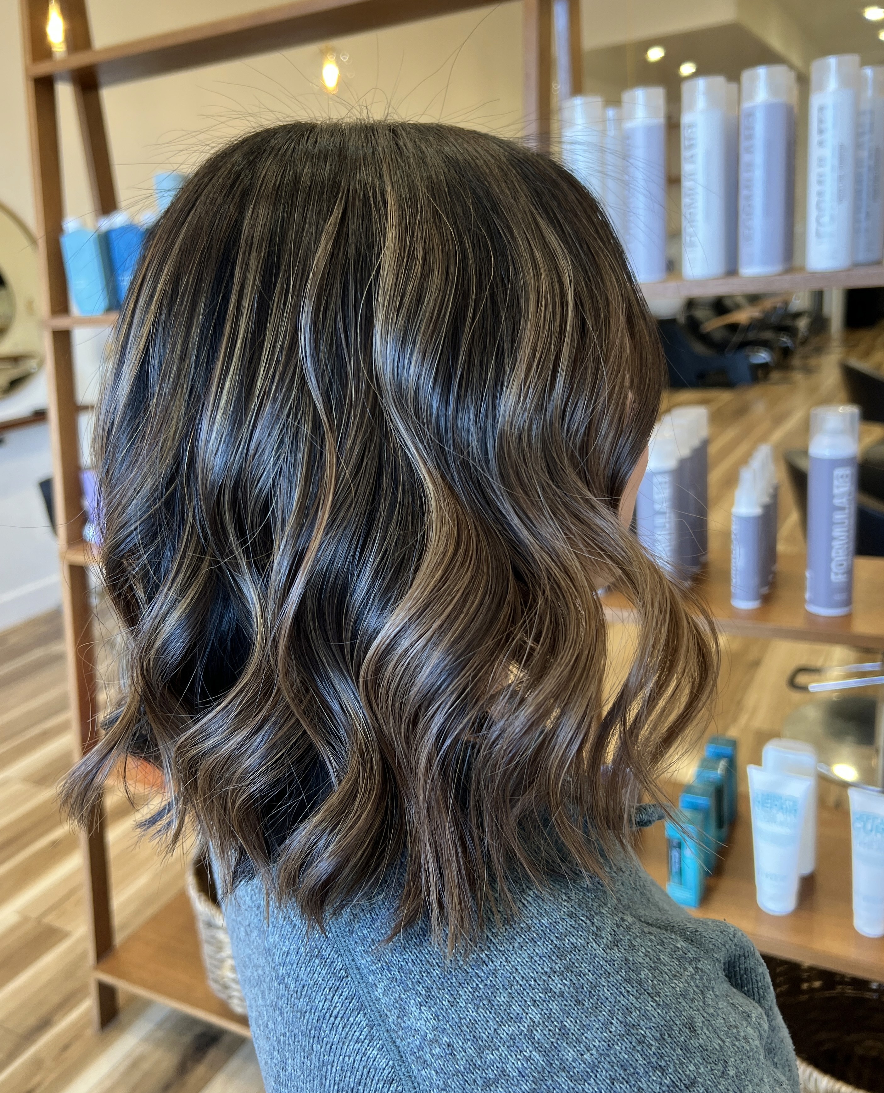 Chocolate bob cut with dimensional highlights by Adriana Jackson at Del Sol Hair Studio Huntington Beach