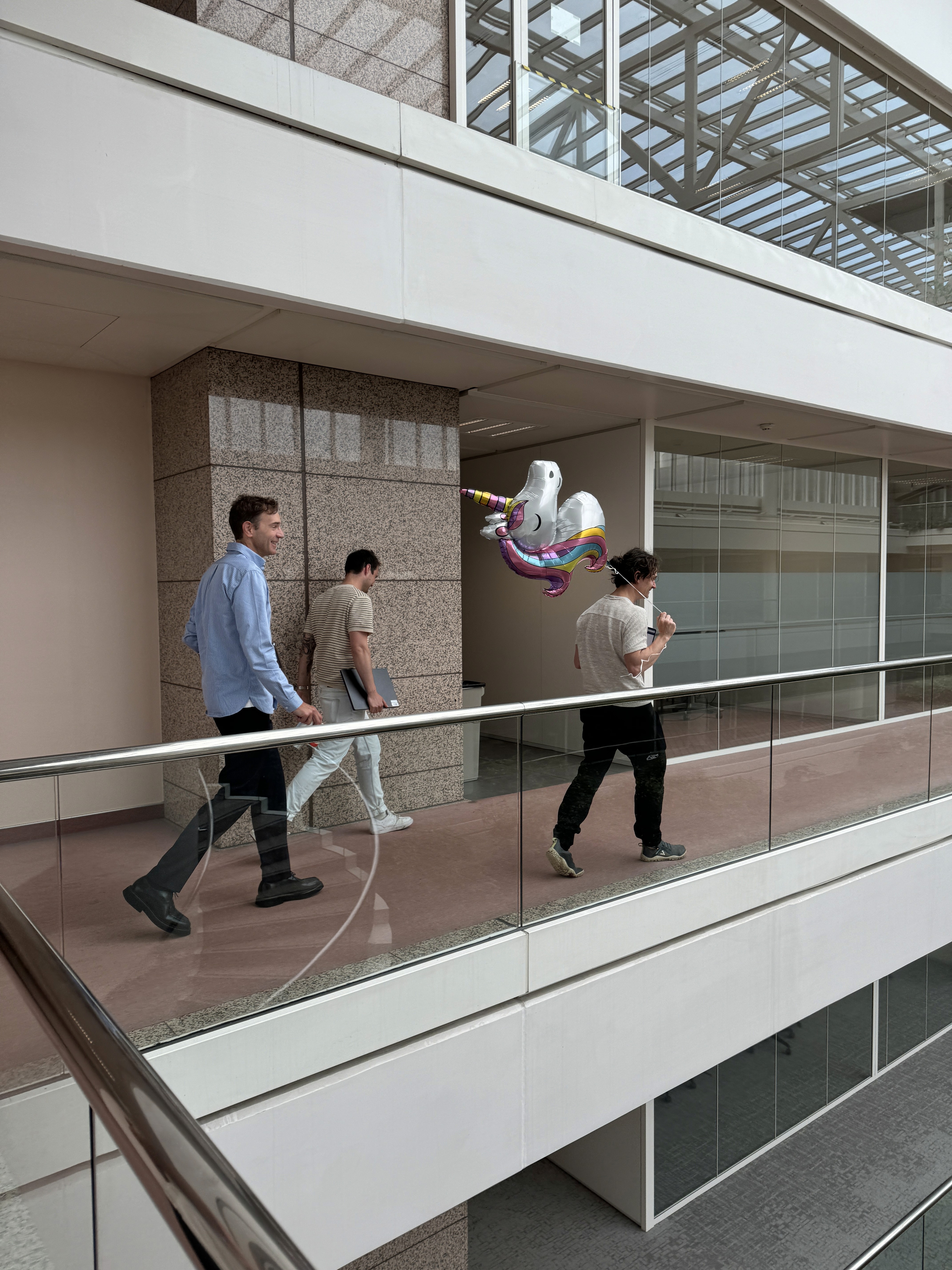 Friends laughing and posing inside a car
