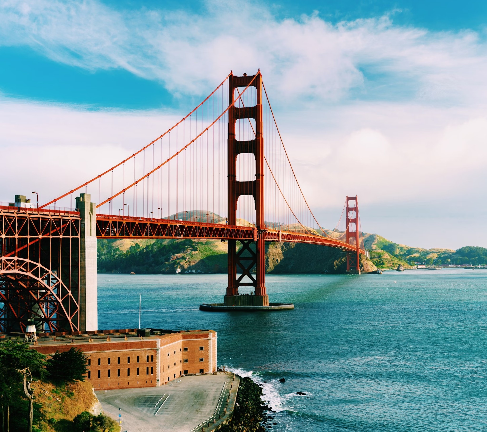 Interior of a cafe or workspace with several people at tables