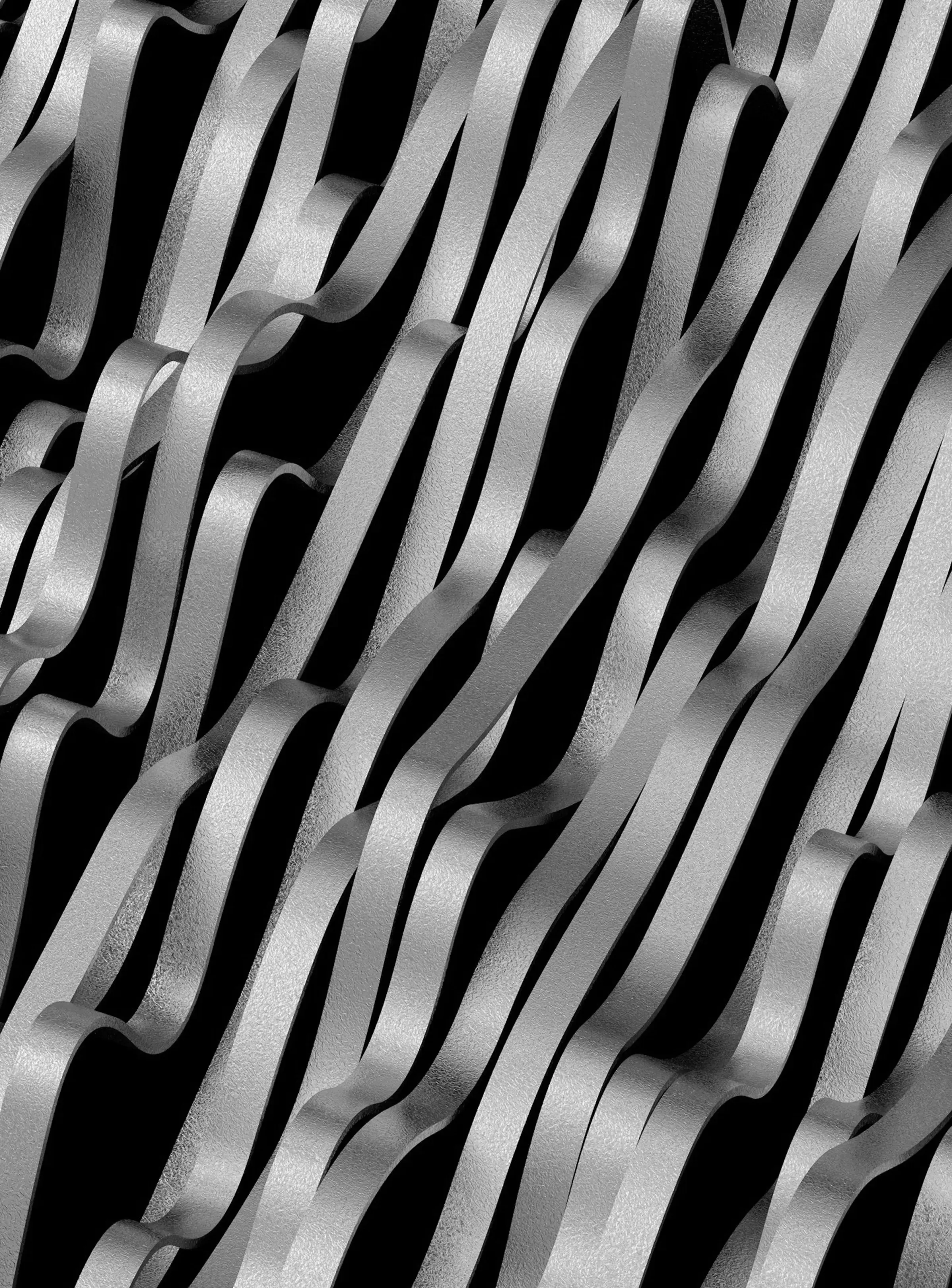 Close-up of rippling metallic surface with a wave pattern