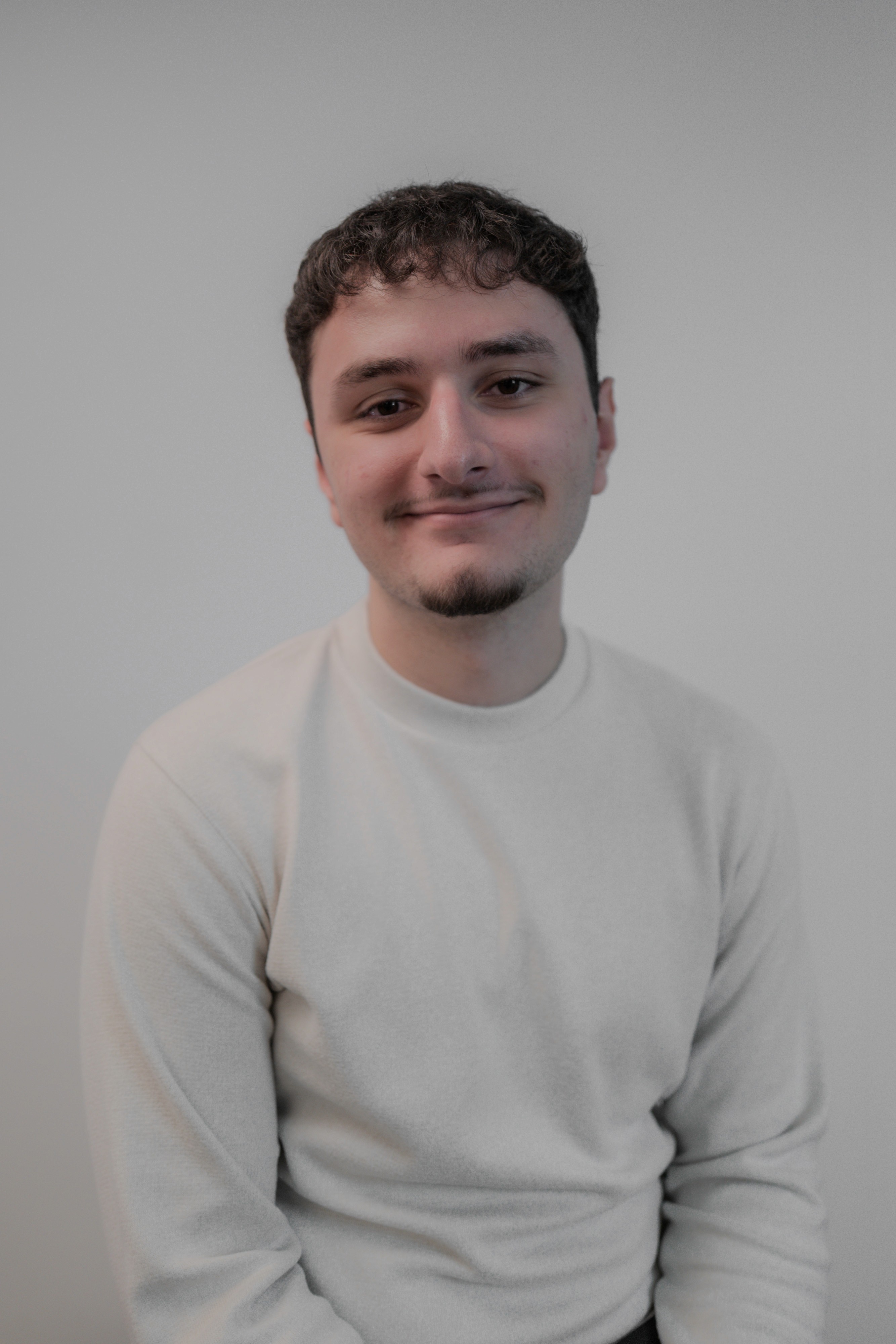 Headshot of Amir Kallushi