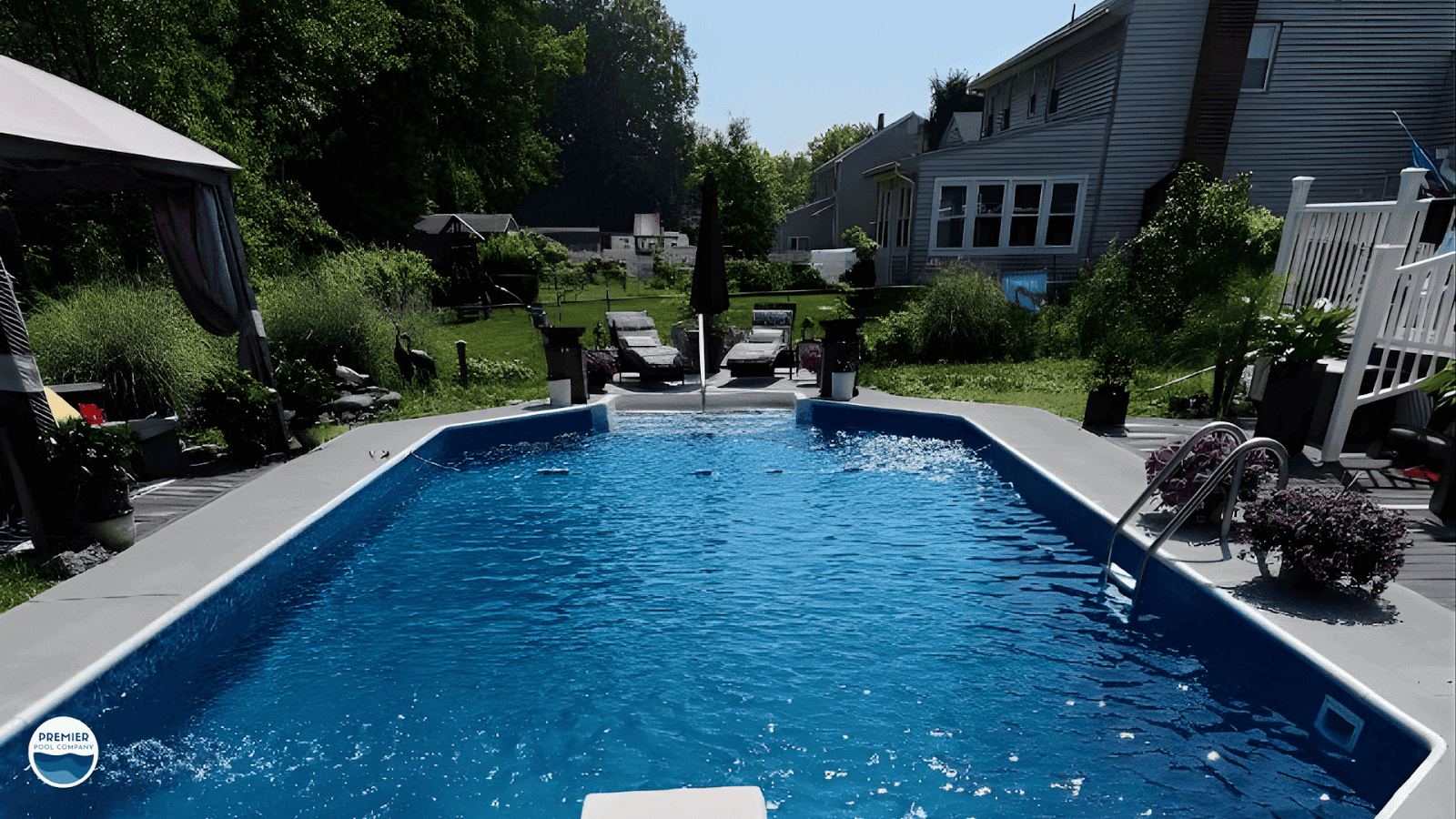 Well-maintained backyard vinyl pool demonstrating long-term care and seasonal maintenance success.