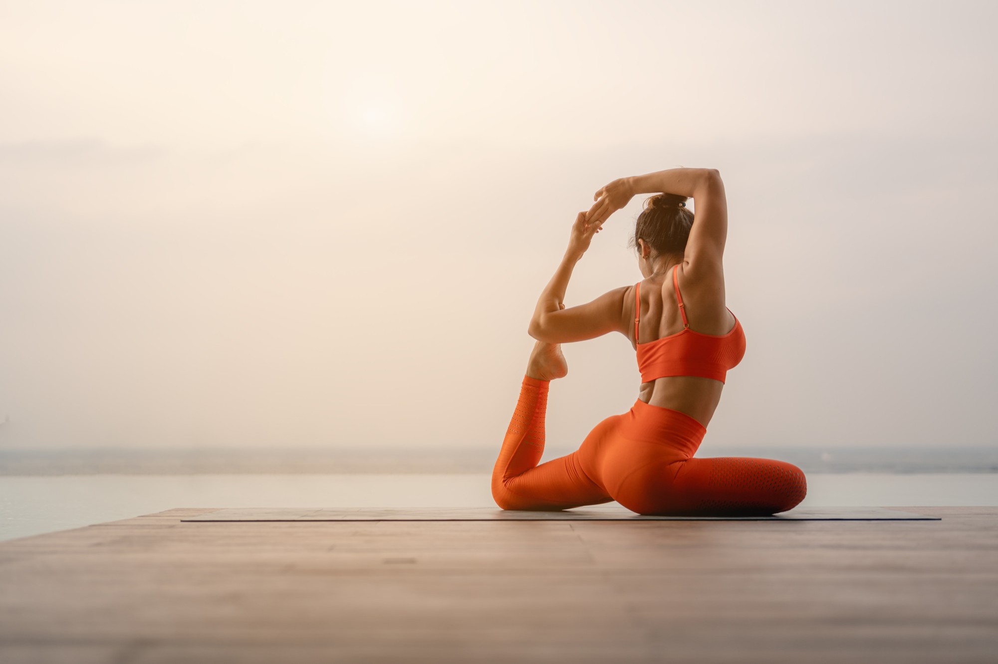 woman doing yoga outside