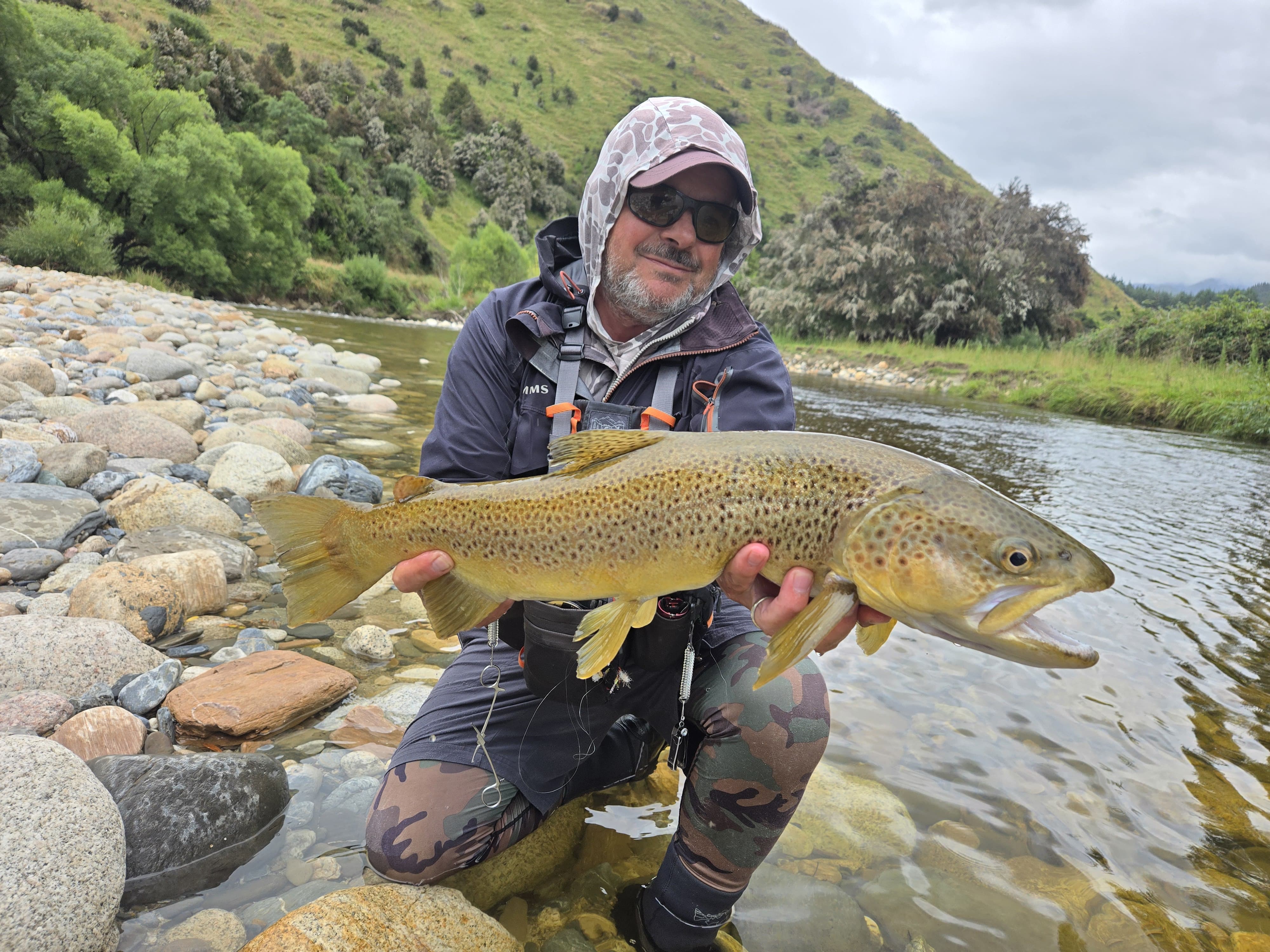 Close-up of fly rod, reel, and 20 ft leader setup for NZ trout