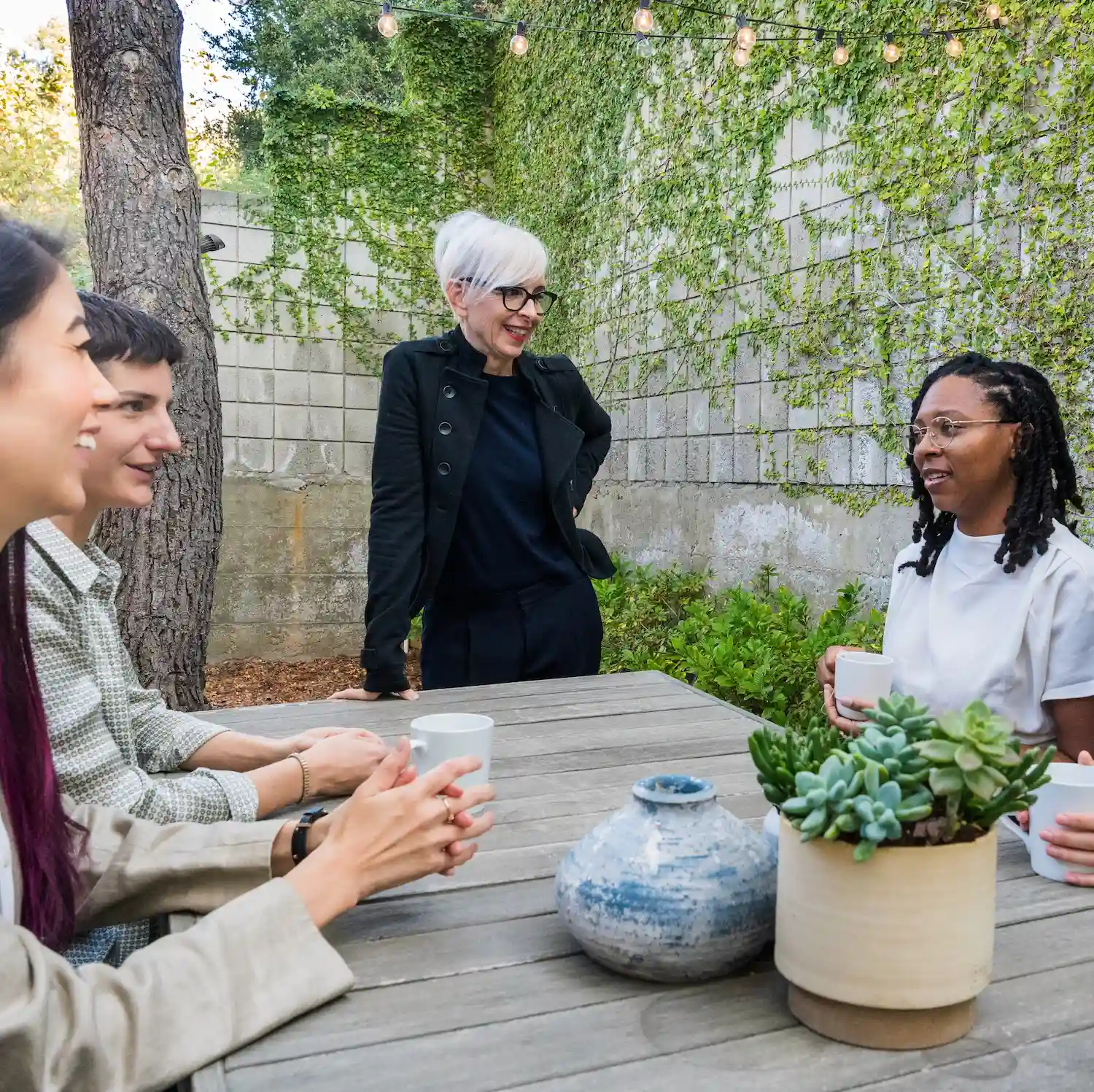 LGBTQ affirming therapist leading an inclusive outdoor group therapy session in Los Angeles, fostering connection, belonging, and holistic mental health support.