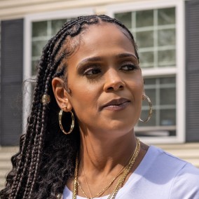 Possible member looking away from the camera.