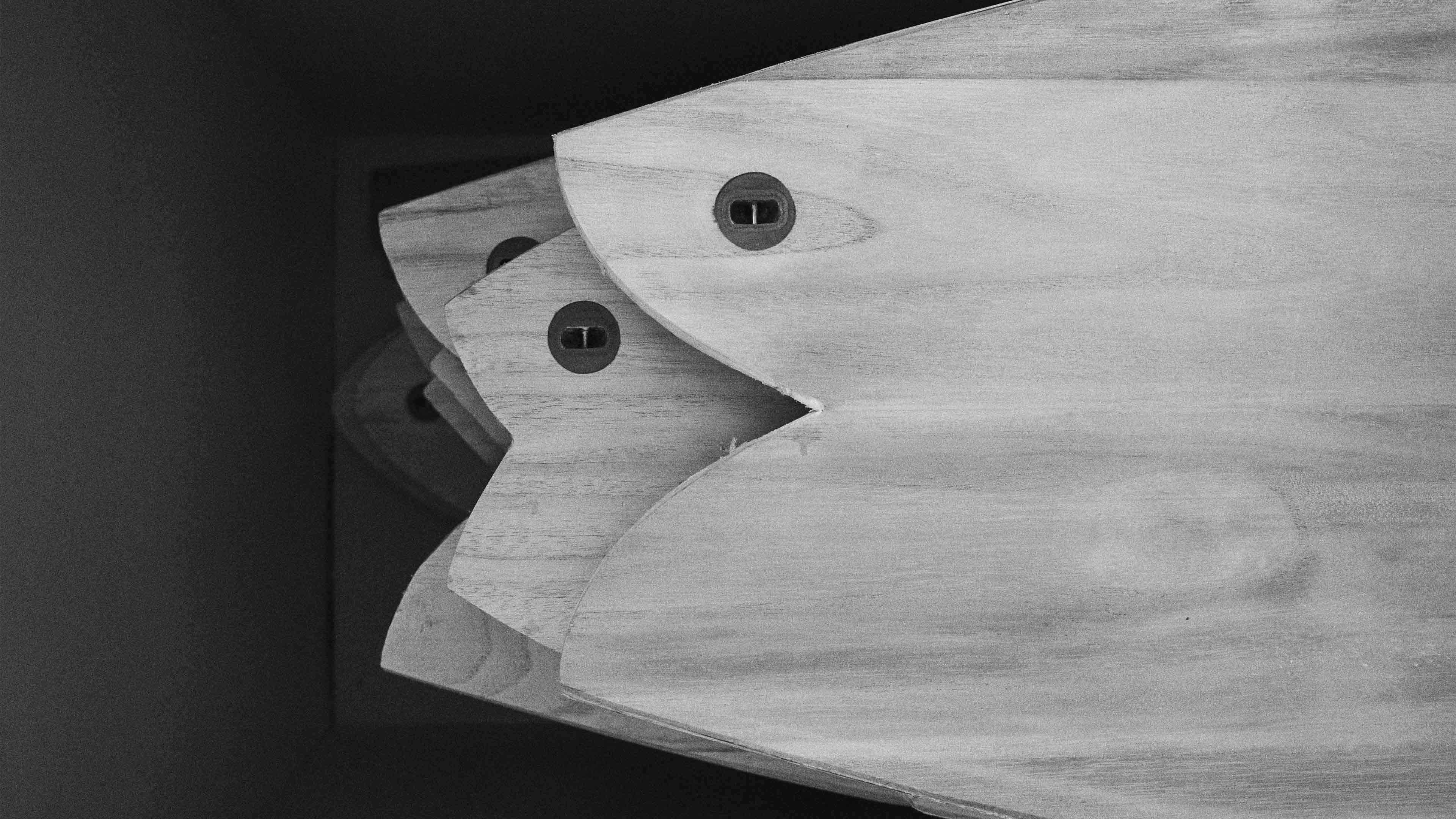 Crate of wooden surfboard blanks