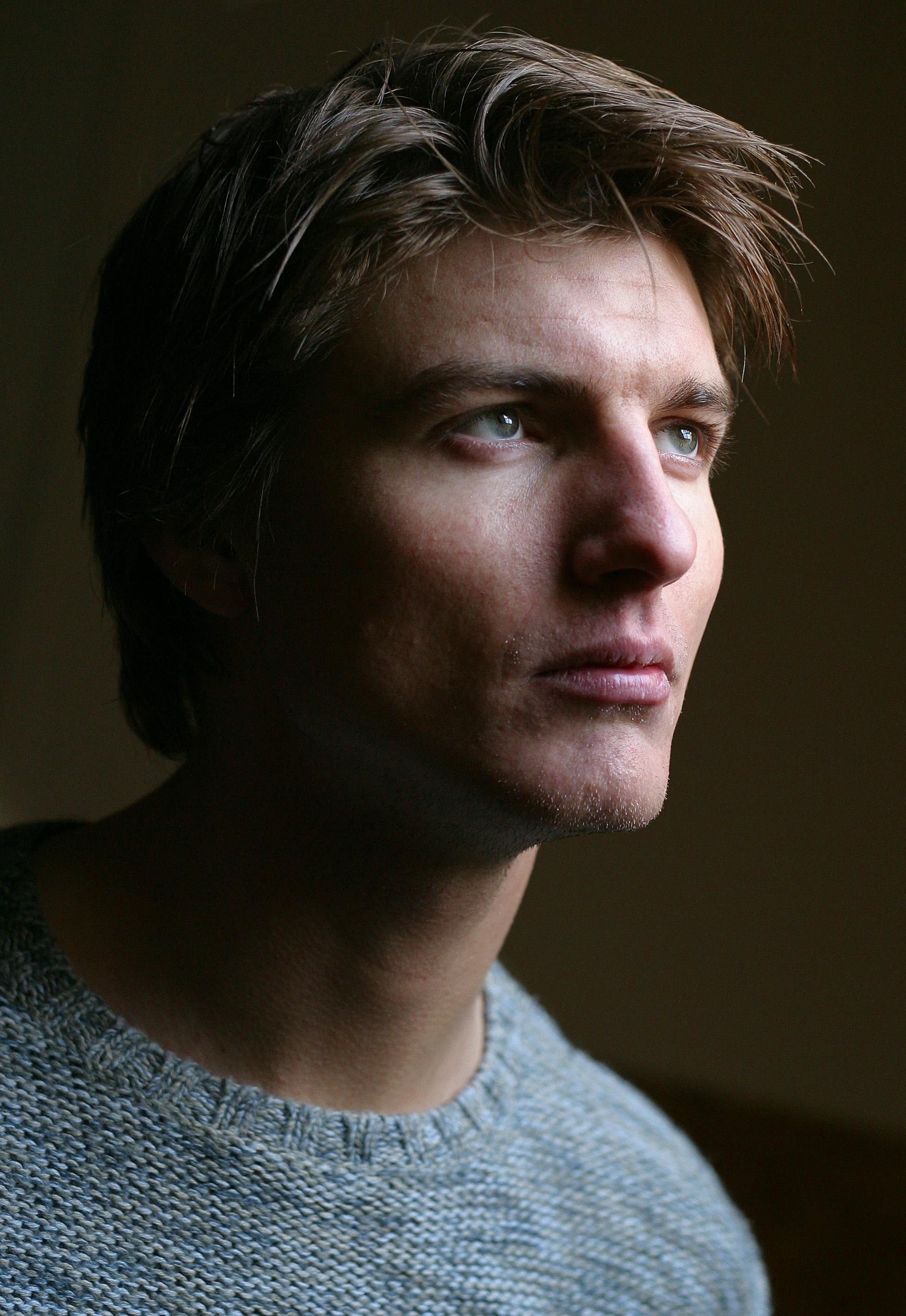 Close up portrait of person in low light