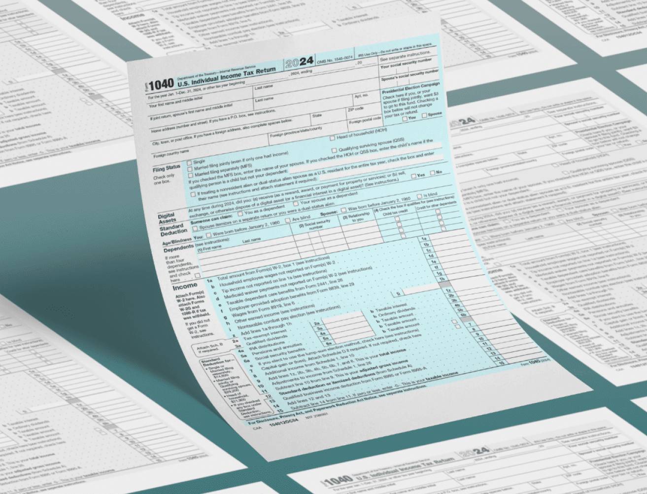 Aerial view of a winding road cutting through rocky terrain and sandy landscape.