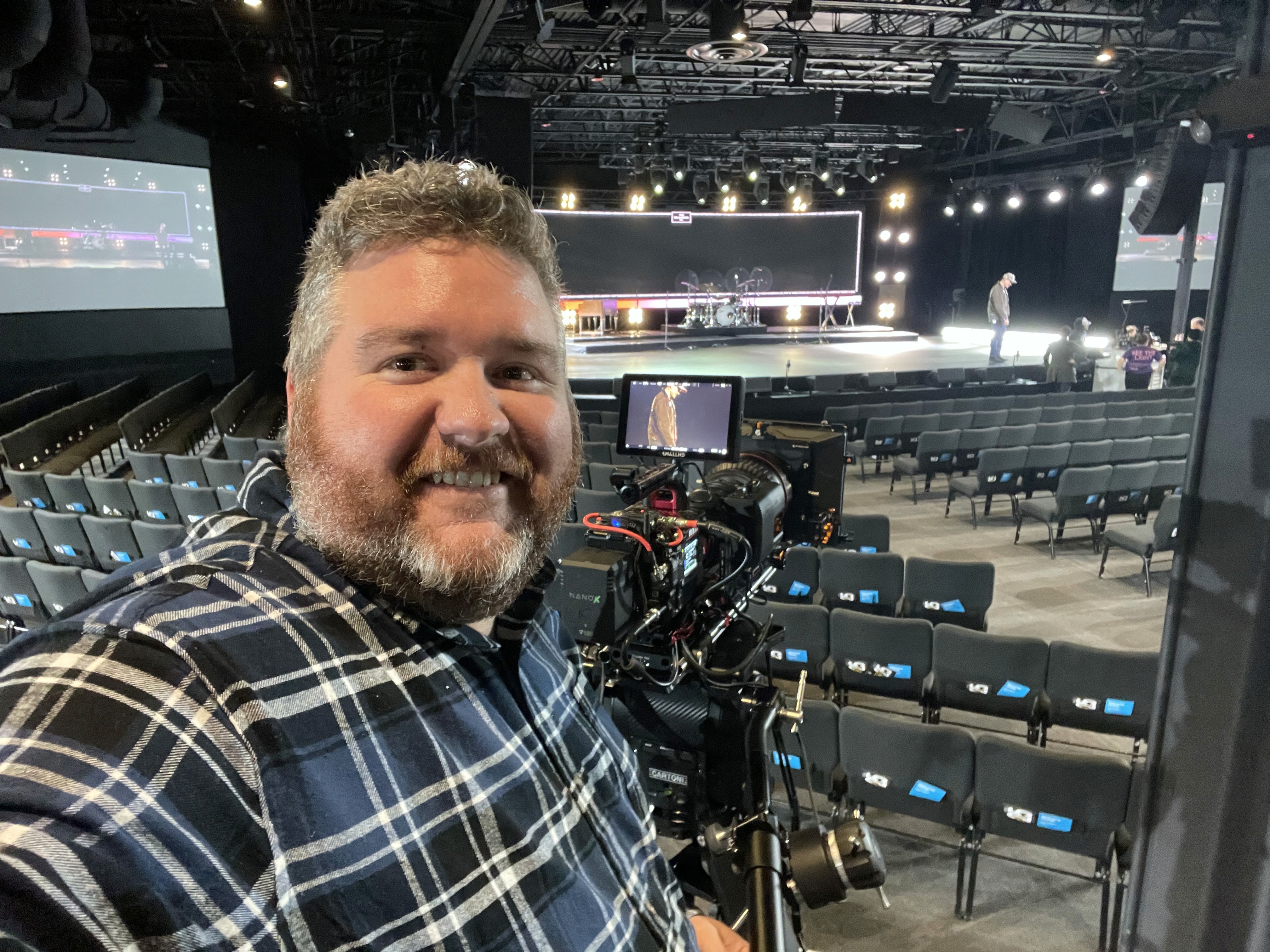 Music producer sitting in his studio