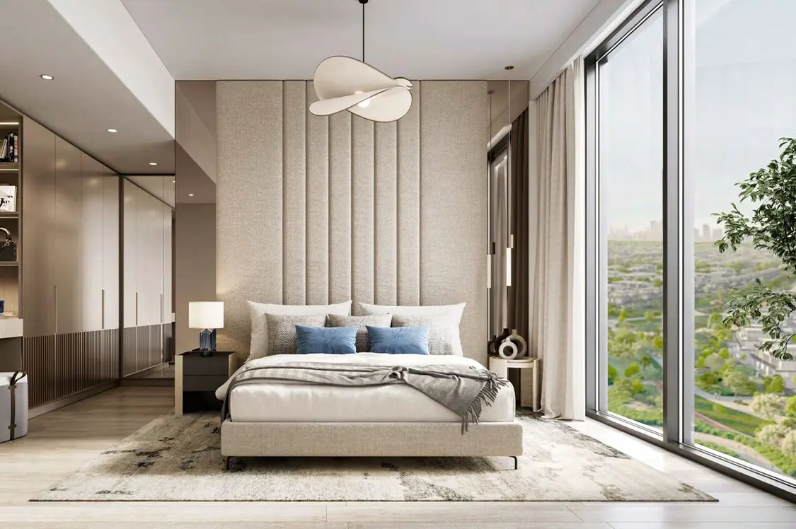 A sleek modern bedroom with a flat screen TV, highlighting a minimalist aesthetic and comfortable atmosphere.