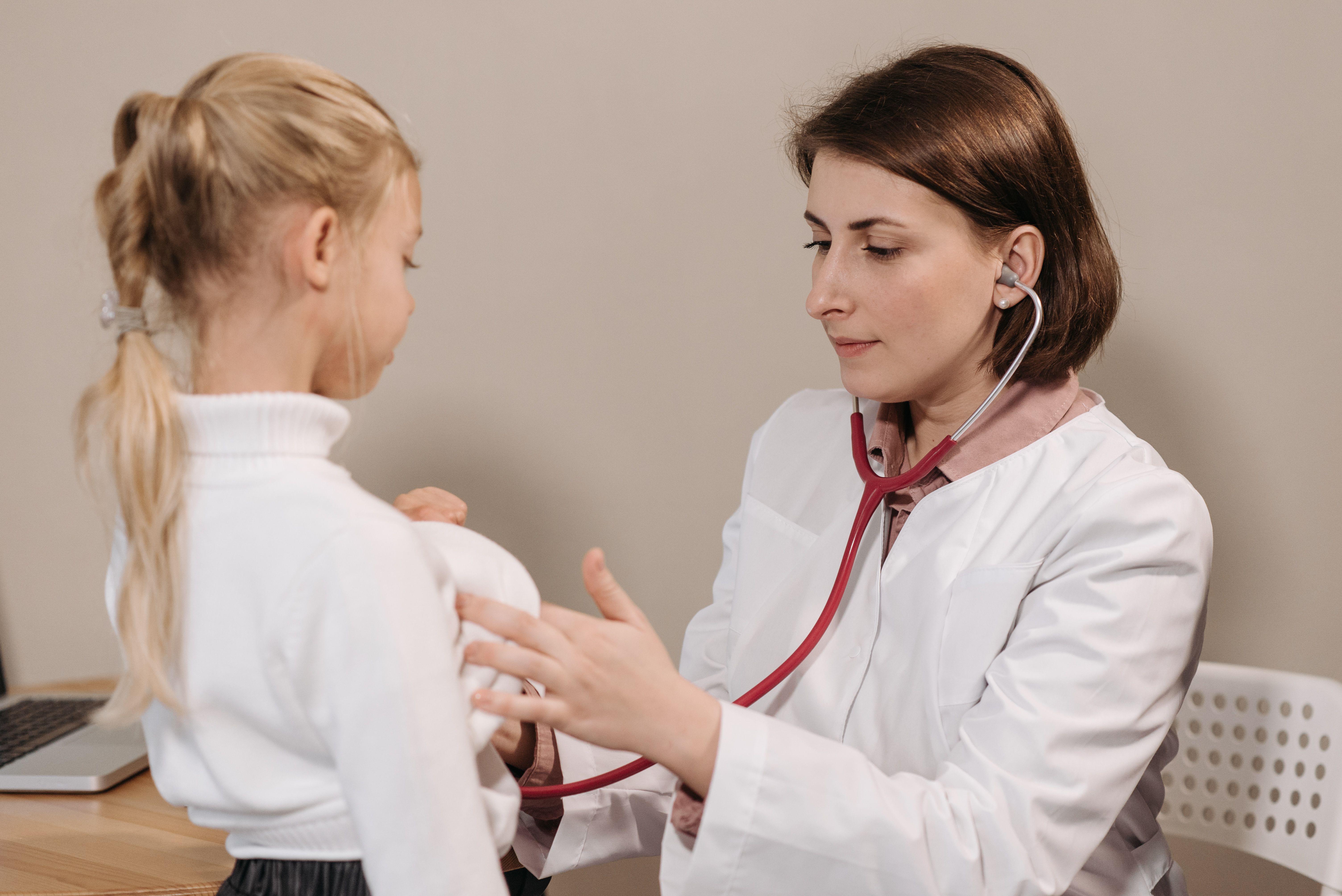 doctor-performing-a-health-check-up-on-a-child-using-a-stethoscope-in-a-clinic-s - pavel-danilyuk (pexels)