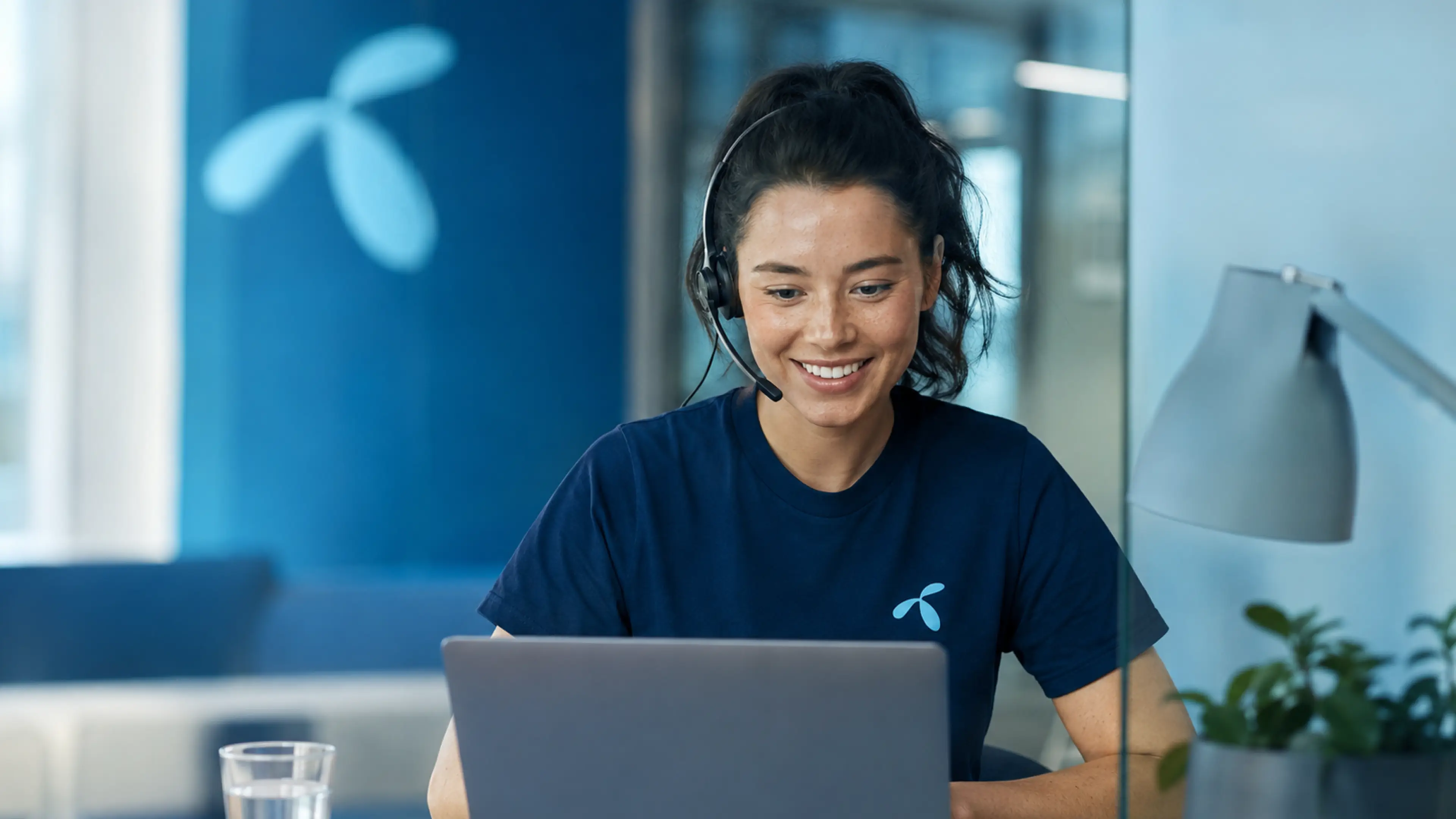 Woman sitting in front of computer