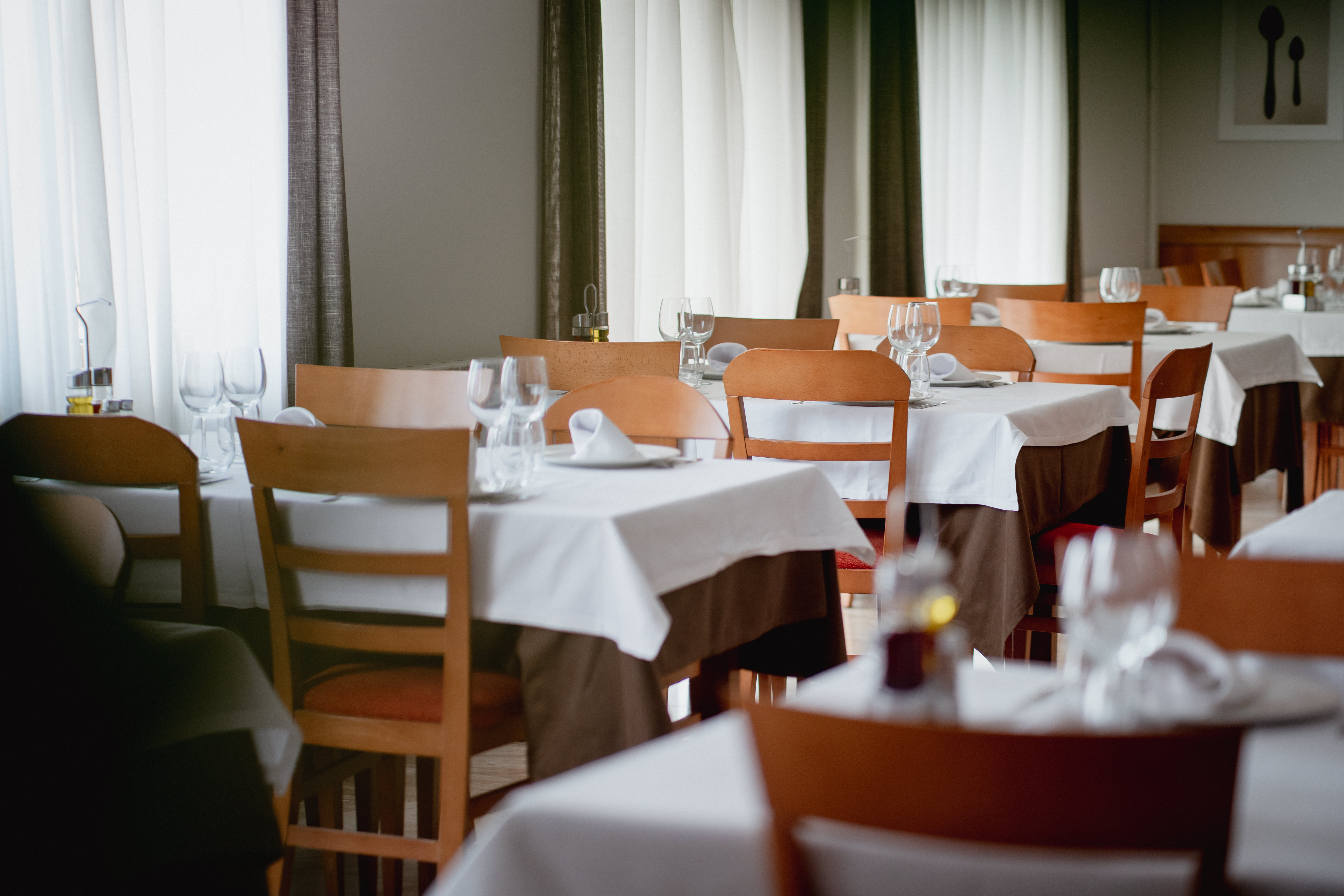 luxury restauarant interior in blue colors with large chandelier