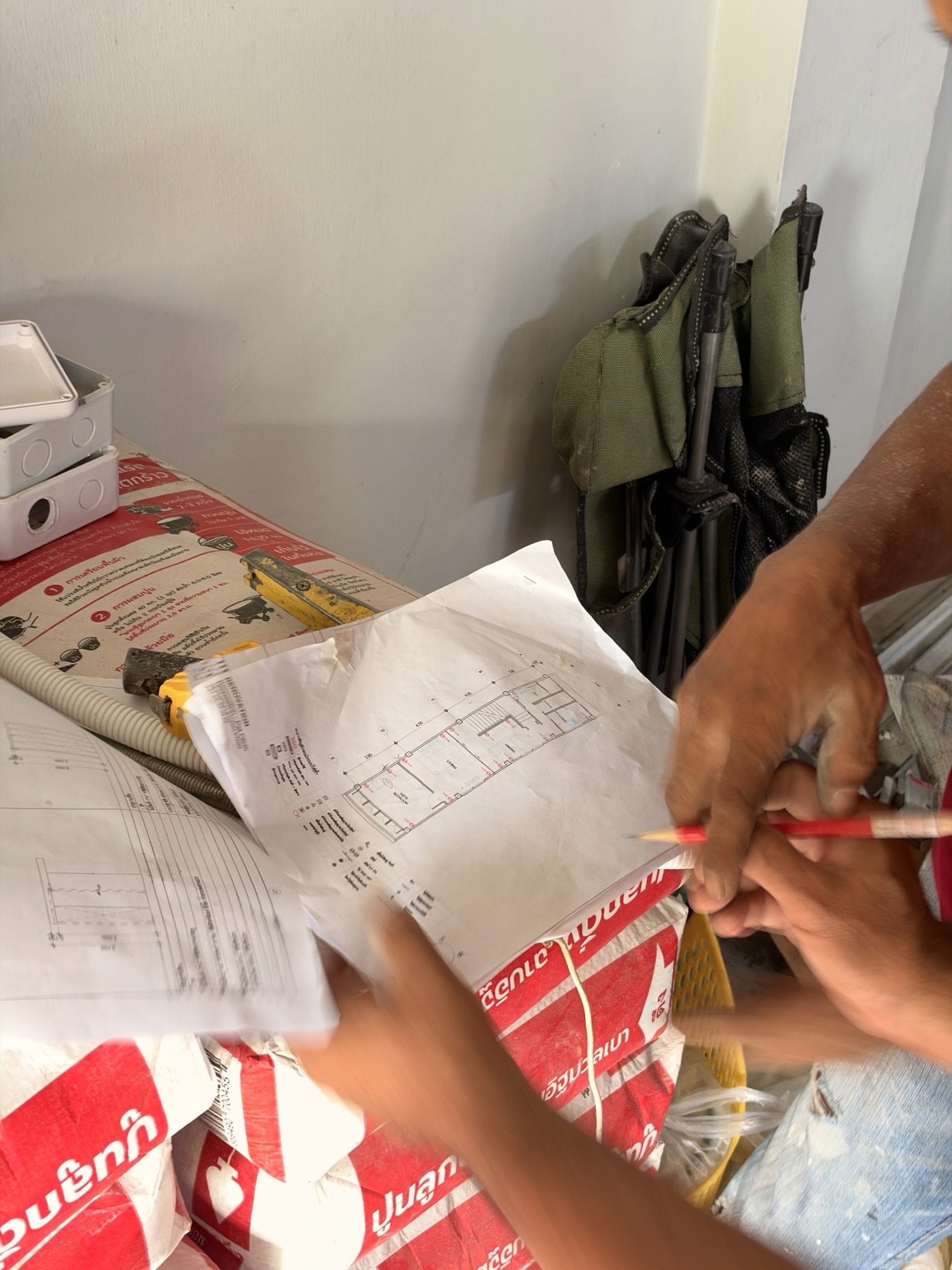 Reviewing plans together on site — PLANE & PLACE