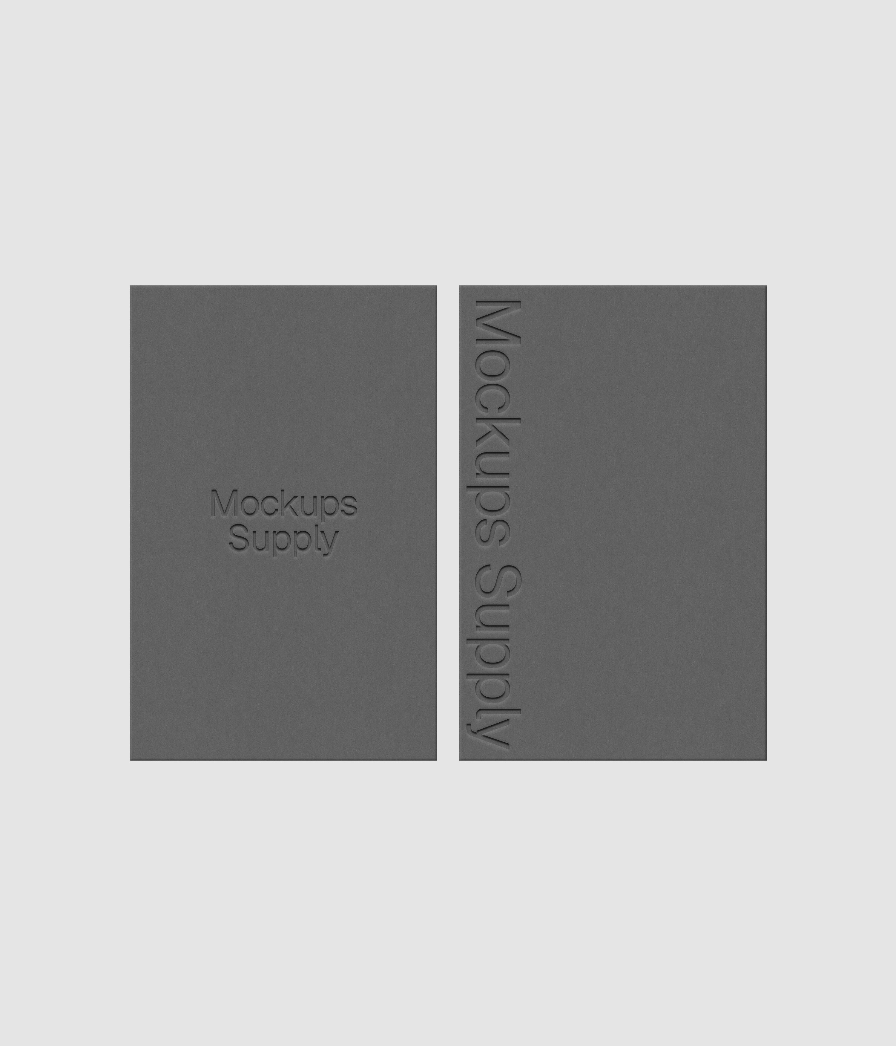 Two European business cards mockup PSD with debossed logo effect, gray cards on white background, clean modern stationery mockup for brand identity