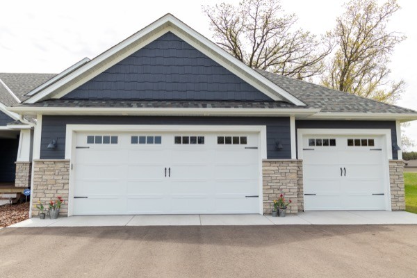 New three stall garage blue siding