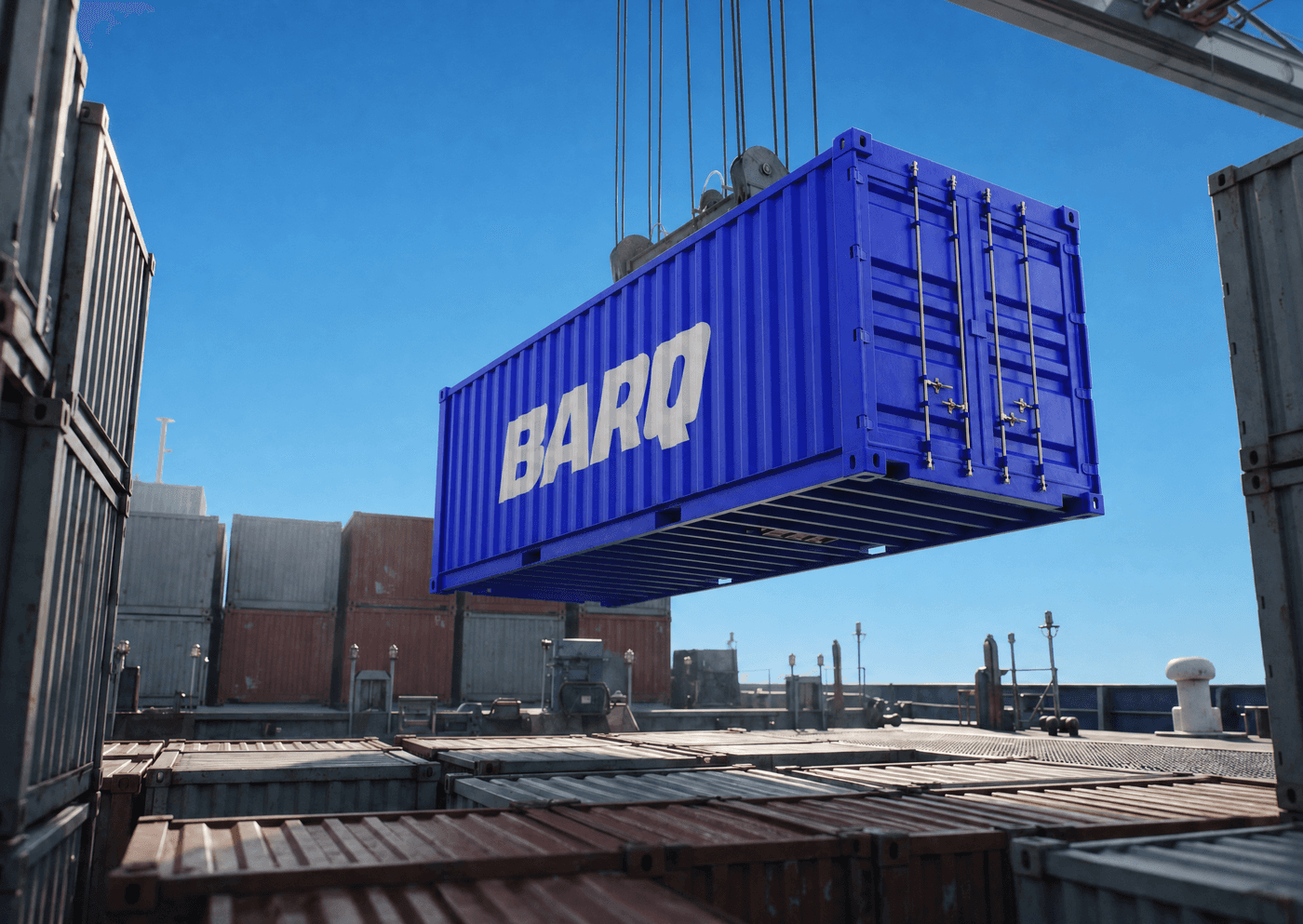 A blue Barq shipping container lifted by crane over a container yard