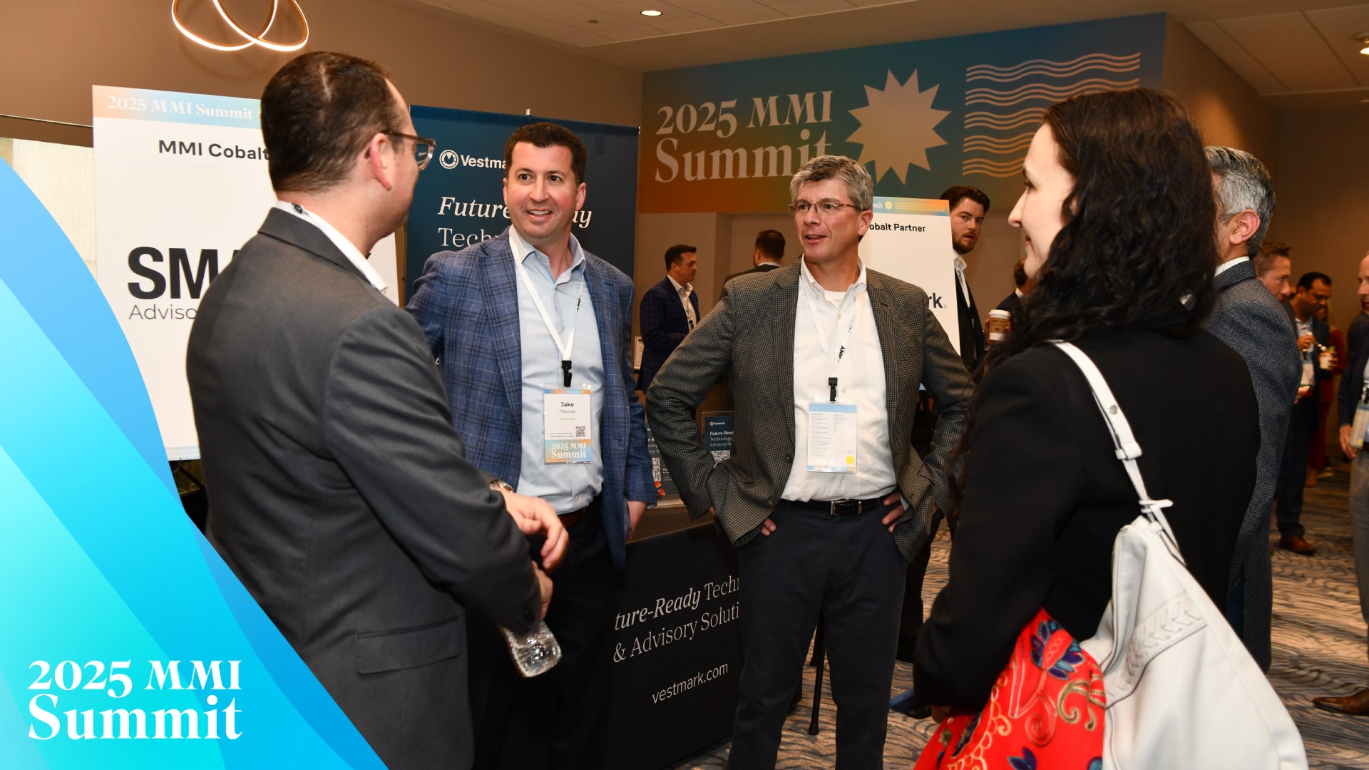 2025 MMI Summit photo with branded border of a group of professionals networking in the main hall of the hotel