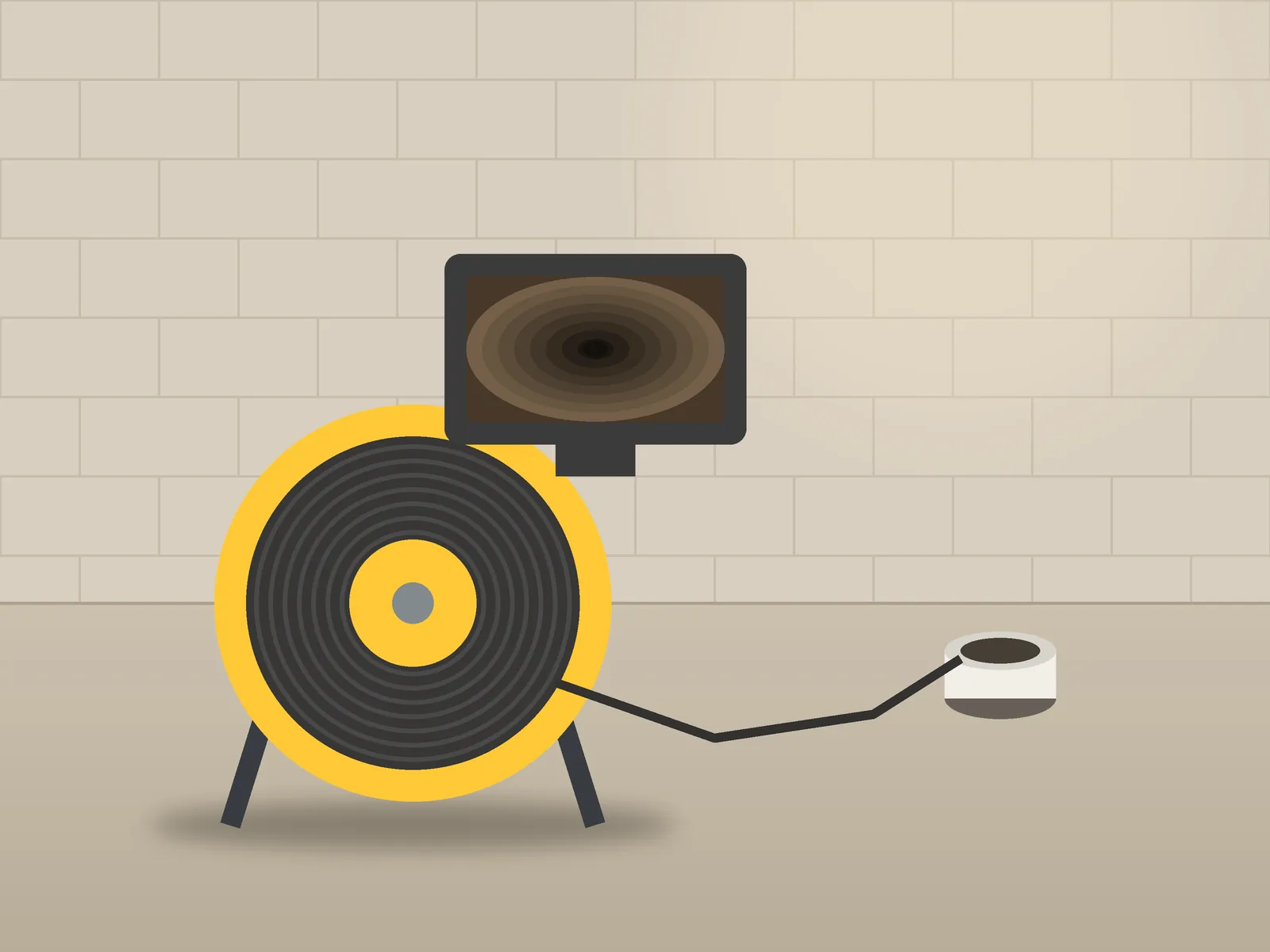 Sewer camera reel and monitor beside a basement floor cleanout