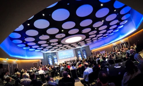 Photo taken at the Build IT right event showing a conference room full of people