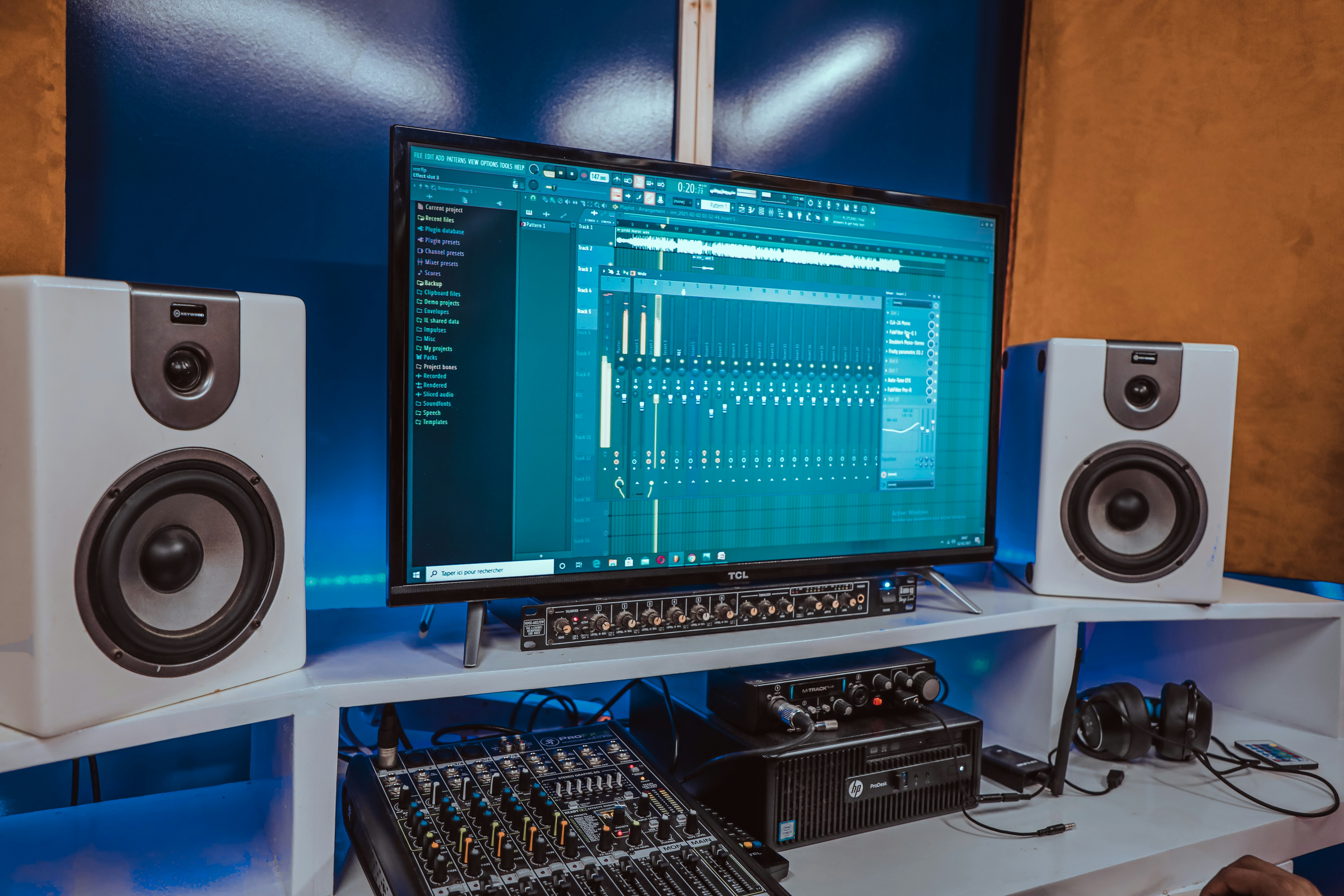 a studio desk setup - audio separation software