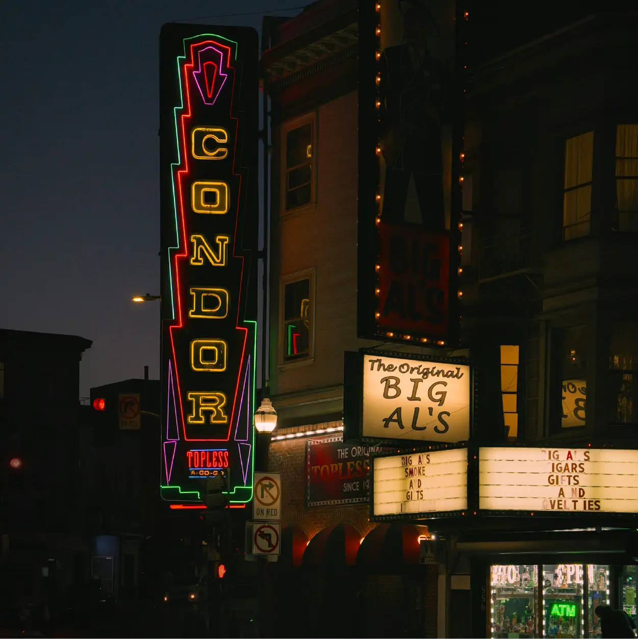 Photo of neon signage at a gentlemen’s club in North Beach, San Francisco.